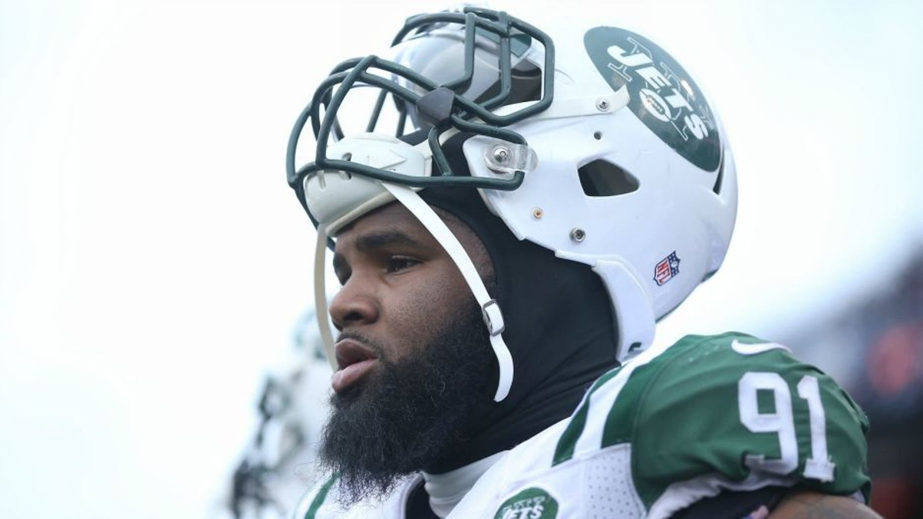 ORCHARD PARK, NY - JANUARY 3: Sheldon Richardson #91 of the New York Jets looks on from the sideline against the Buffalo Bills during NFL game action at Ralph Wilson Stadium on January 3, 2016 in Orchard Park, New York. (Photo by Tom Szczerbowski/Getty Images) *** Local Caption *** Sheldon Richardson