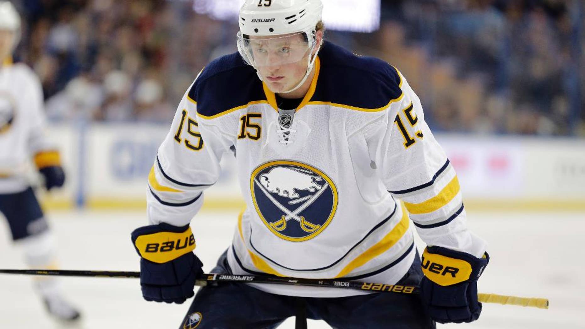 FILE - In this Nov. 10, 2015, file photo, Buffalo Sabres center Jack Eichel (15) gets ready for a faceoff against the Tampa Bay Lightning during the third period of an NHL hockey game in Tampa, Fla. Eichel was helped off the ice after hurting his left leg during practice on Wednesday, Oct. 12, 2016. he was in front of the net when he got tangled up with a defensemen and his leg buckled beneath him. The injury occurred a day before the Sabres open the season hosting the Montreal Canadiens. (AP Photo/Chris O'Meara, File)