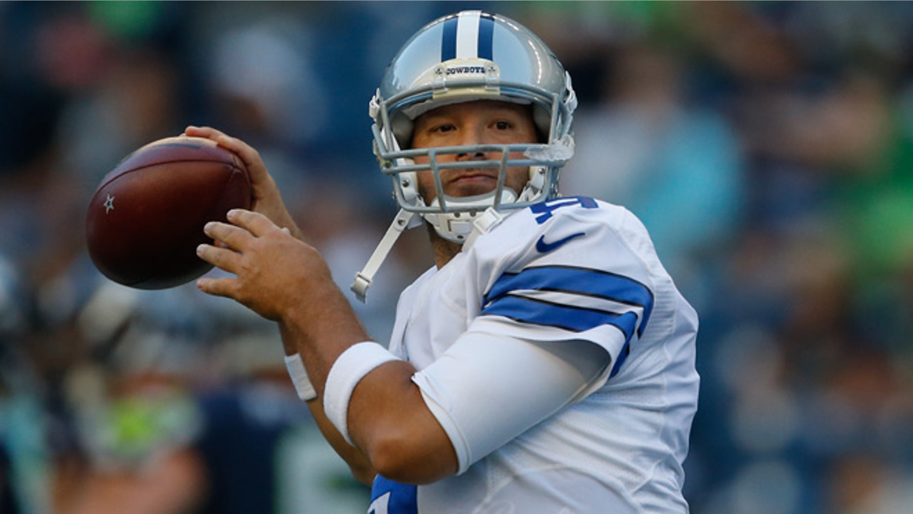 SEATTLE, WA - AUGUST 25: Quarterback Tony Romo #9 of the Dallas Cowboys warms up prior to the preseason game against the Seattle Seahawks at CenturyLink Field on August 25, 2016 in Seattle, Washington. (Photo by Otto Greule Jr/Getty Images)