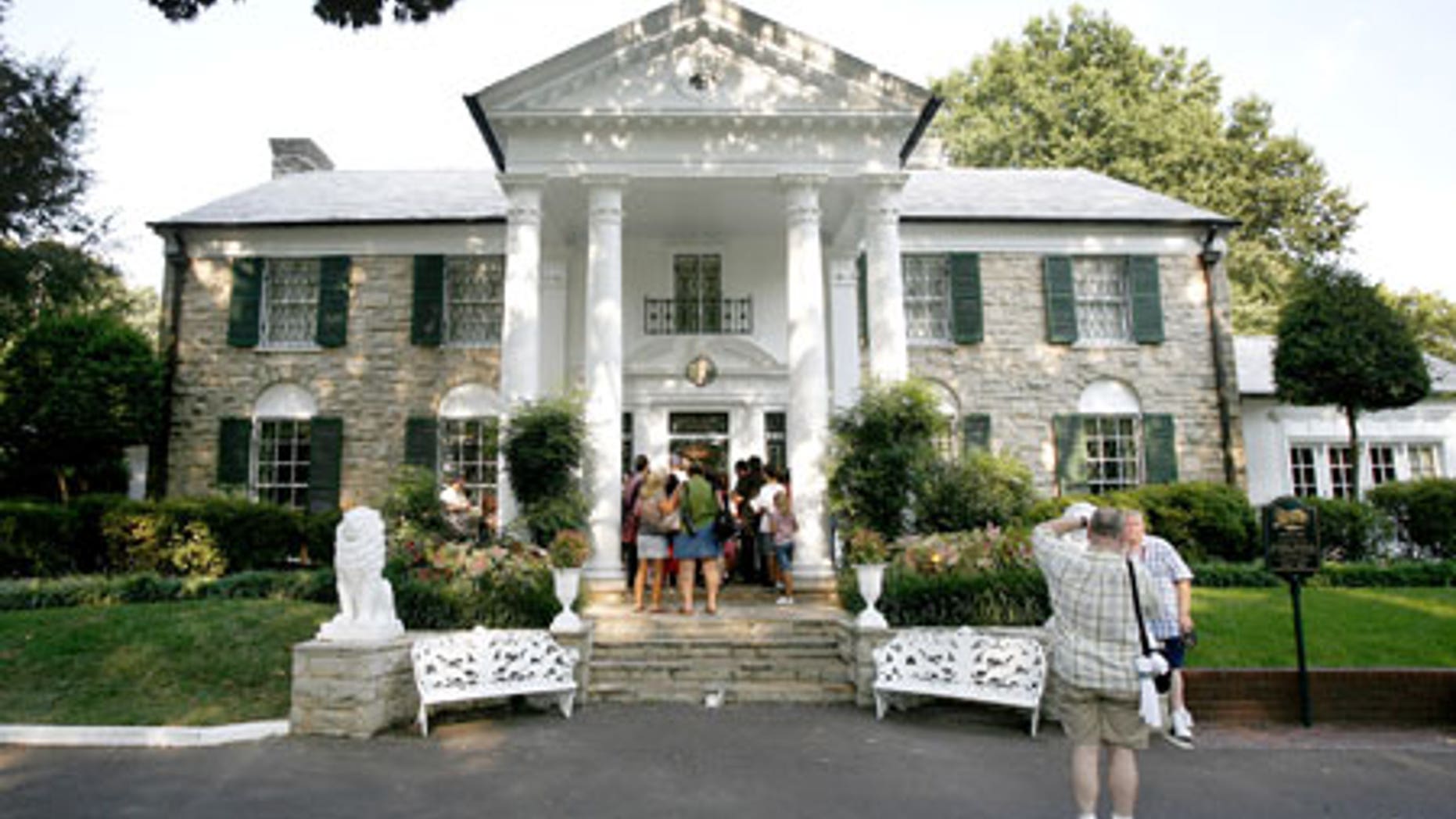 The Graceland estate and mansion is the former home of rock legend Elvis Presley and is now the site of a museum dedicated to the king of rock and roll. An annual procession is held that allows fans to travel through the estate and past Elvis' grave on the anniversary of his death. In 2002, it was estimated that a whopping 40,000 people attended the procession, despite pouring rain.