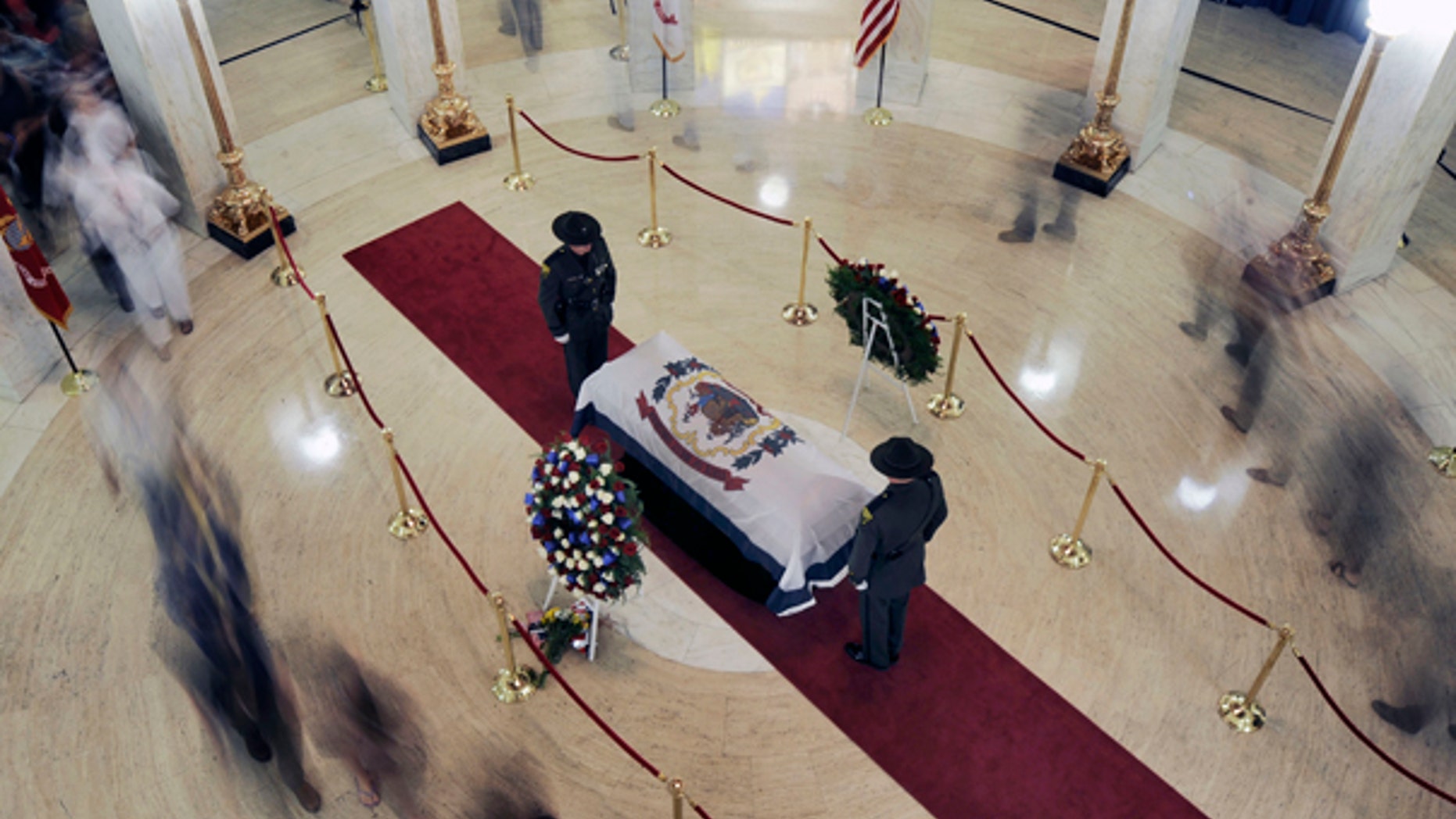 July 1: People file past Sen. Byrd's casket in the Charleston, W.Va. capitol building.