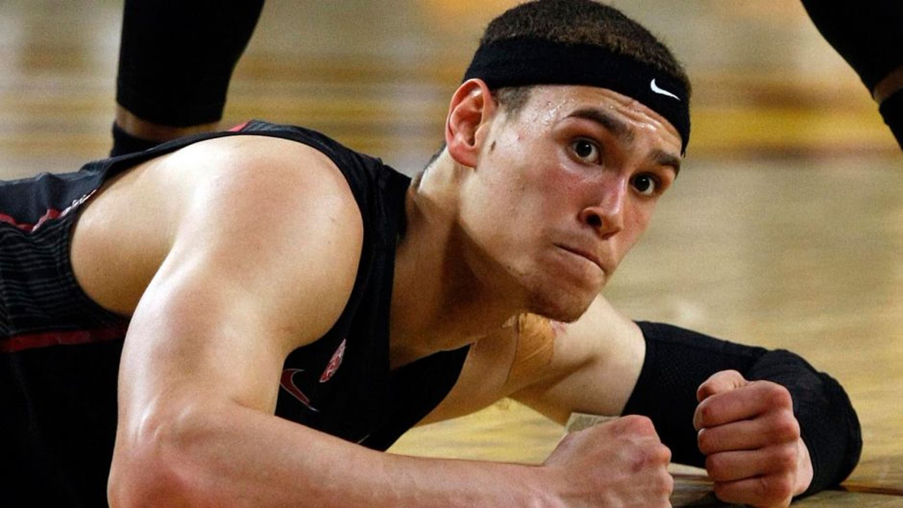 Feb 26, 2014; Tempe, AZ, USA; Stanford Cardinal forward Dwight Powell (33) reacts after getting fouled and knocked to the ground against the Stanford Cardinal during the first half at Wells Fargo Arena. Mandatory Credit: Rick Scuteri-USA TODAY Sports