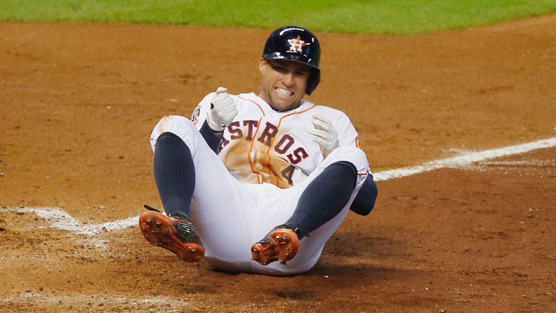 HOUSTON, TX - JULY 01: George Springer #4 of the Houston Astros gets hit by a pitch in the fifth inning during their game against the Kansas City Royals at Minute Maid Park on July 1, 2015 in Houston, Texas. (Photo by Scott Halleran/Getty Images)