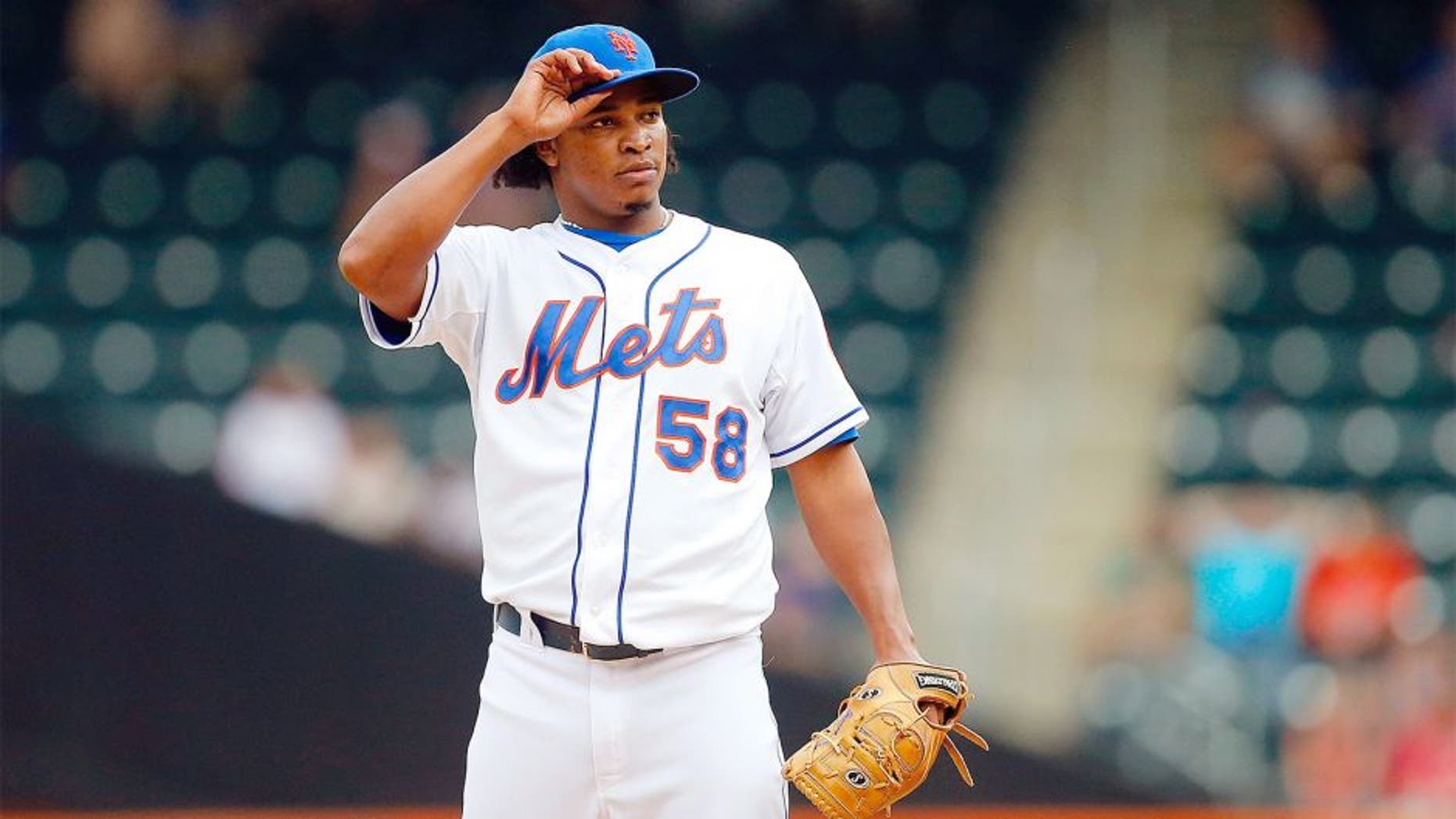 NEW YORK, NY - AUGUST 31: Jenrry Mejia #58 of the New York Mets in action against the Philadelphia Phillies at Citi Field on August 31, 2014 in the Flushing neighborhood of the Queens borough of New York City. The Mets defeated the Phillies 6-5. (Photo by Jim McIsaac/Getty Images) *** Local Caption *** Jenrry Mejia