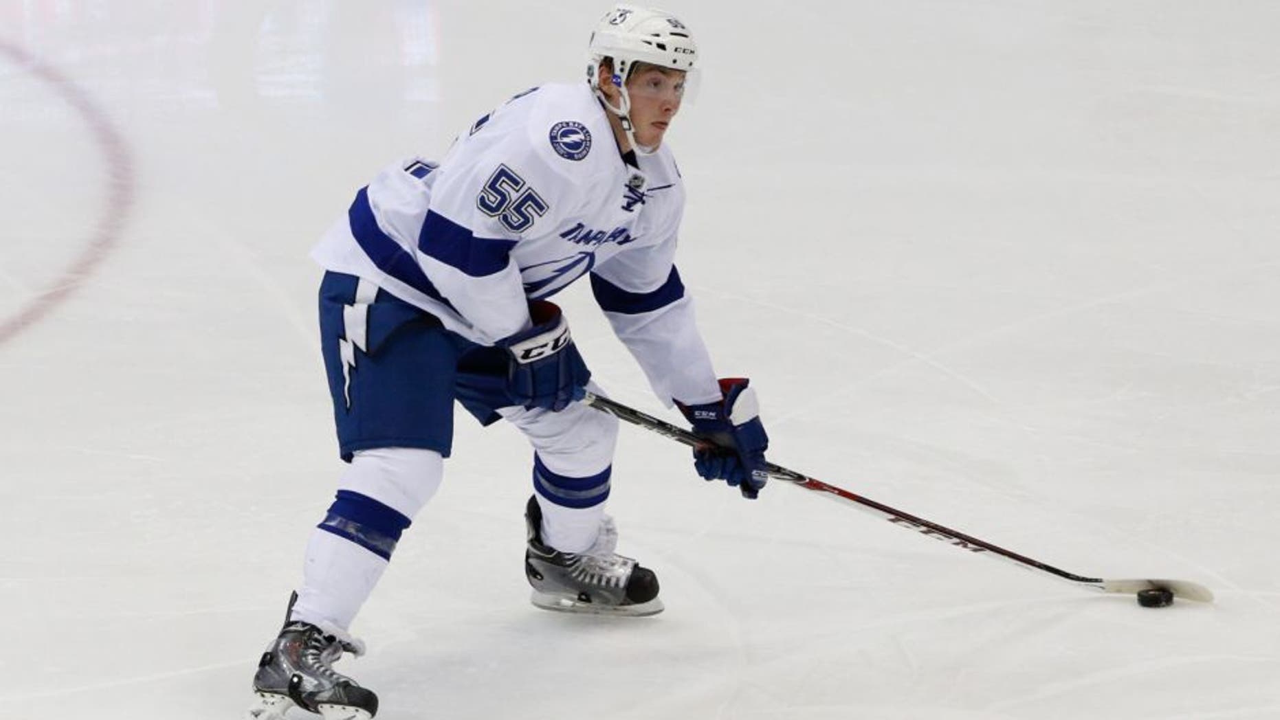 Dec 17, 2013; Uniondale, NY, USA; Tampa Bay Lightning defenseman Matt Taormina (55) looks to pass during the second period against the New York Islanders at Nassau Veterans Memorial Coliseum. Mandatory Credit: Anthony Gruppuso-USA TODAY Sports