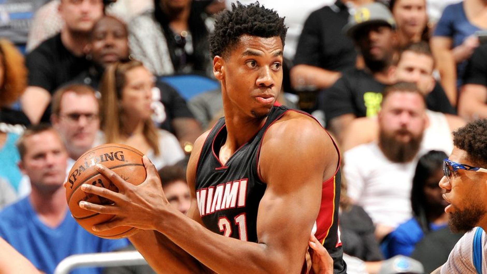 ORLANDO, FL - APRIL 8: Hassan Whiteside #21 of the Miami Heat handles the ball during the game against the Orlando Magic on April 8, 2016 at Amway Center in Orlando, Florida. NOTE TO USER: User expressly acknowledges and agrees that, by downloading and or using this photograph, User is consenting to the terms and conditions of the Getty Images License Agreement. Mandatory Copyright Notice: Copyright 2016 NBAE (Photo by Fernando Medina/NBAE via Getty Images)