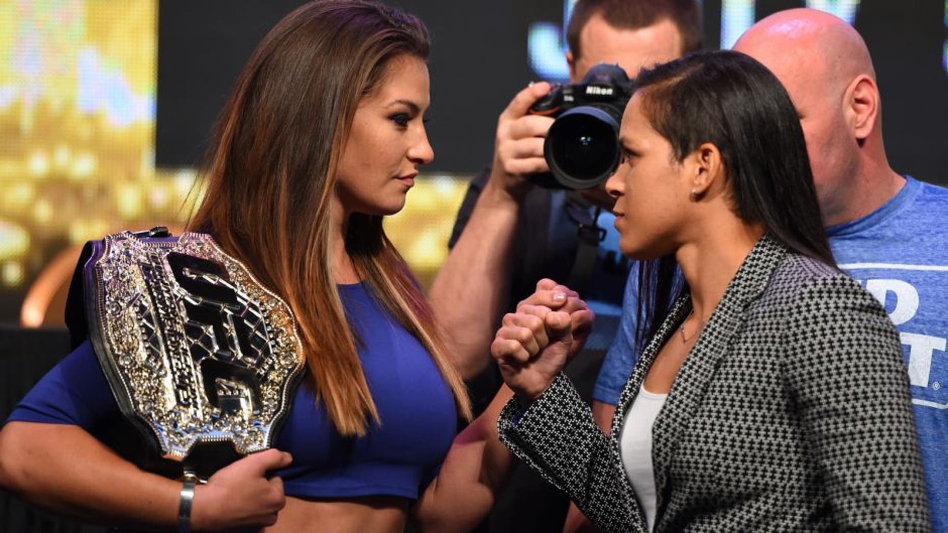 LAS VEGAS, NV - APRIL 20: (L-R) Opponents Miesha Tate and Amanda Nunes of Brazil face off during the UFC 200 press conference at the MGM Grand Garden Arena on April 20, 2016 in Las Vegas, Nevada. (Photo by Josh Hedges/Zuffa LLC/Zuffa LLC via Getty Images)