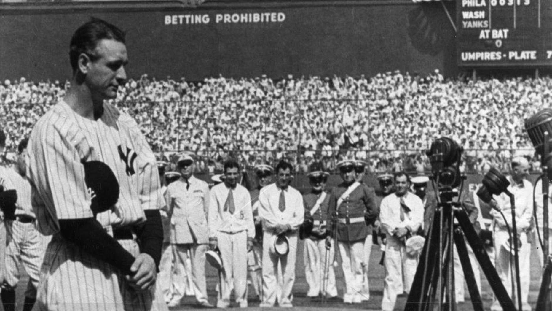 NEW YORK - JULY 4, 1939. Lou Gehrig, first baseman for the New York Yankees, is shown at the microphone during Lou Gehrig Appreciation Day, a farewell to the slugger, at Yankee Stadium on July 4, 1939. (Photo by Mark Rucker/Transcendental Graphics, Getty Images) *** Local Caption *** Lou Gehrig