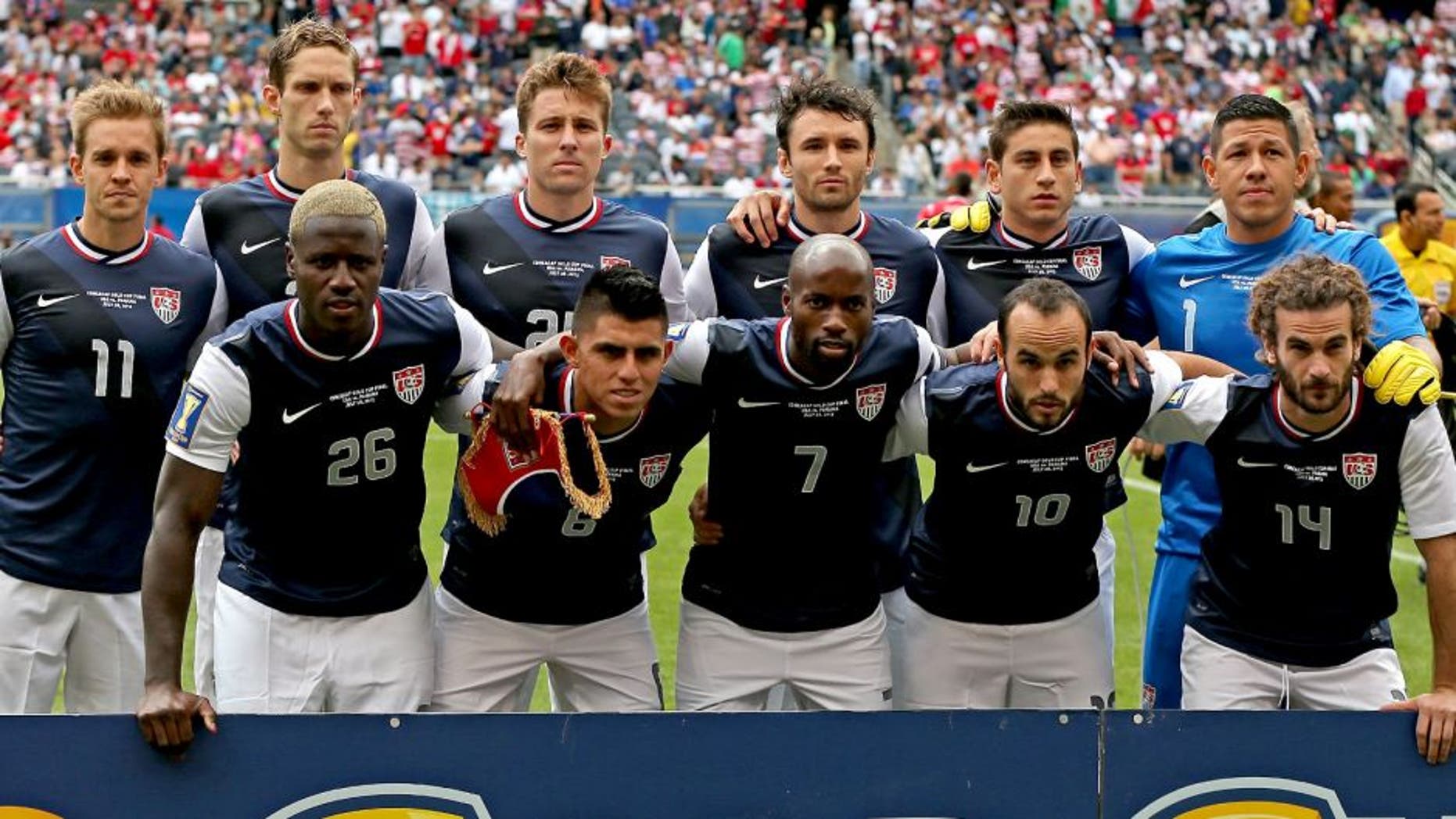 CHICAGO, IL - JULY 28: (Front L-R) Eddie Johnson #26, Joe Cornoa #6, DeMarcus Beasley #7, Landon Donovan #10 and Kyle Beckerman #14 (Back L-R) Stuart Holden #11, Clarence Goodson #21, Matt Besler #25, Michael Parkhurst #15, Alejandro Bedoya and Nick Rimando #1 of the United States pose before the CONCACAF Gold Cup final match against Panama at Soldier Field on July 28, 2013 in Chicago, Illinois. The United States defated Panama 1-0. (Photo by Jonathan Daniel/Getty Images)