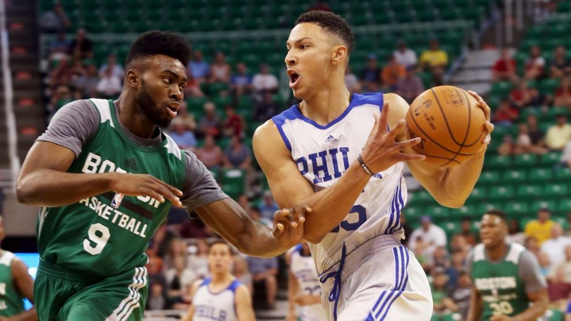 Philadelphia 76ers' Ben Simmons, right, drives the basket past Boston Celtics' Jaylen Brown (9) during an NBA Summer League basketball game Monday, July 4, 2016, in Salt Lake City. (AP Photo/Kim Raff)
