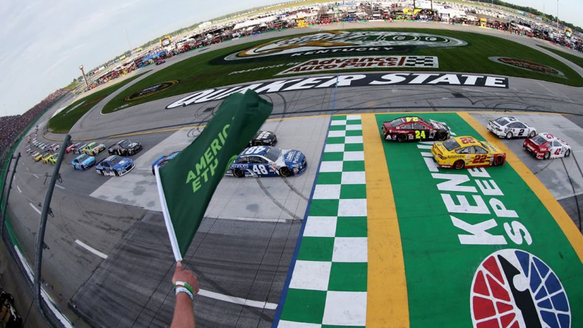 SPARTA, KY - JULY 11: Kyle Larson, driver of the #42 Target Chevrolet, and Brad Keselowski, driver of the #2 Miller Lite Ford, lead the field to the green flag for the running of the NASCAR Sprint Cup Series Quaker State 400 presented by Advance Auto Parts at Kentucky Speedway on July 11, 2015 in Sparta, Kentucky. (Photo by Brian Lawdermilk/NASCAR via Getty Images)