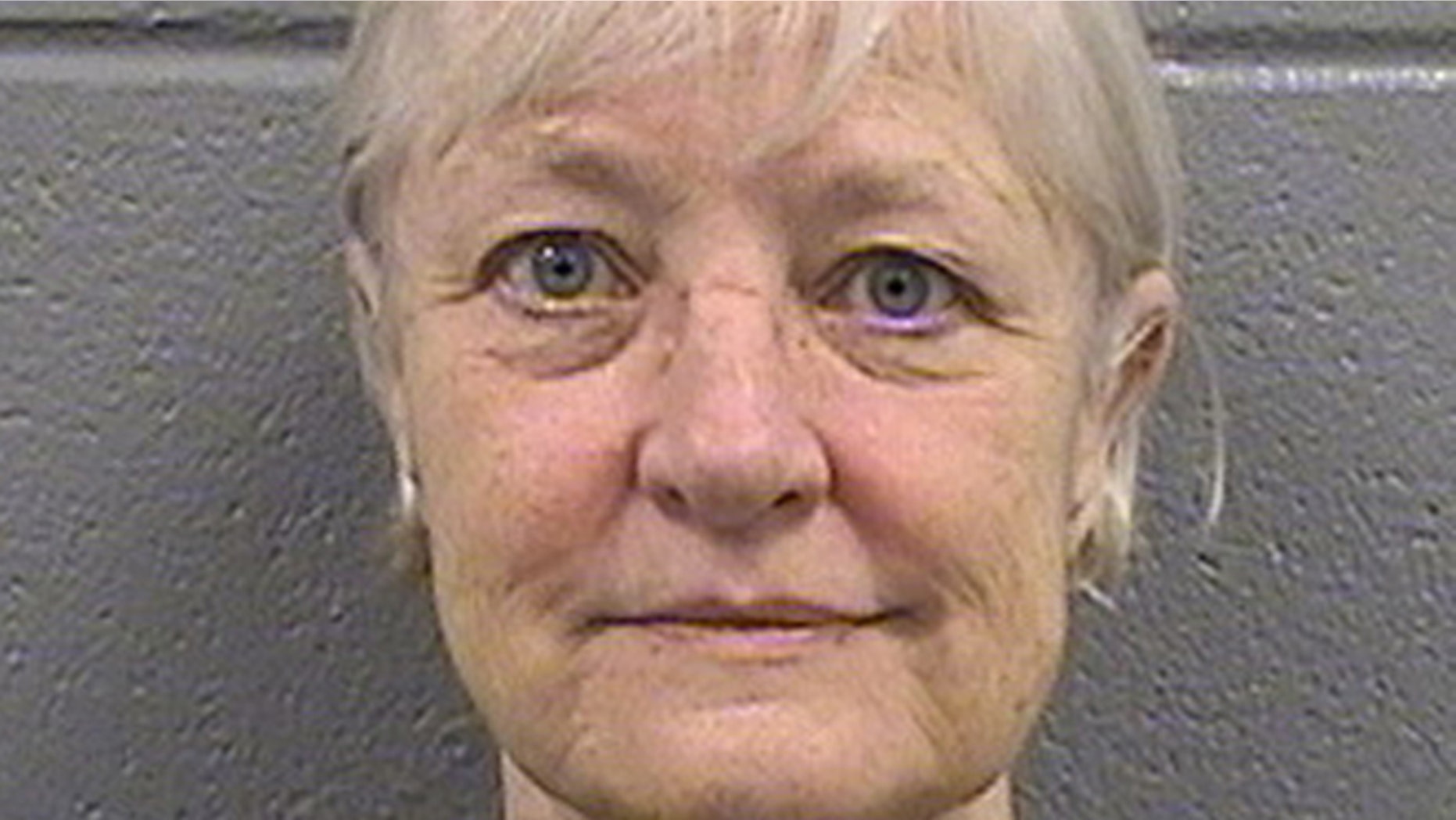 This undated booking photo provided by the Cook County Sheriff's Department shows 63-year-old Marilyn Hartman. Hartman was released from the Cook County Jail in Chicago on Thursday, July 2, 2015, and says shes through with her run of stowaway attempts.