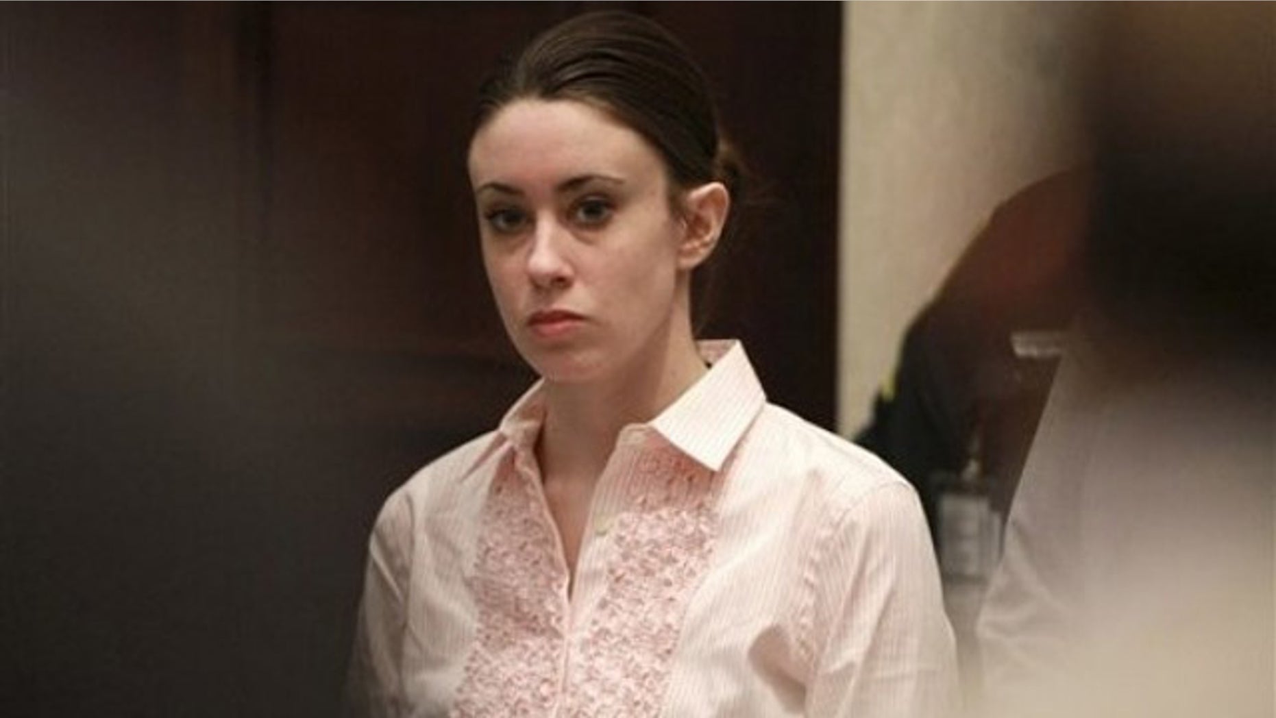 July 5: Casey Anthony stands for the arrival of the jury at the start of the second day of jury deliberations in her murder trial at the Orange County Courthouse in Orlando, Fla.