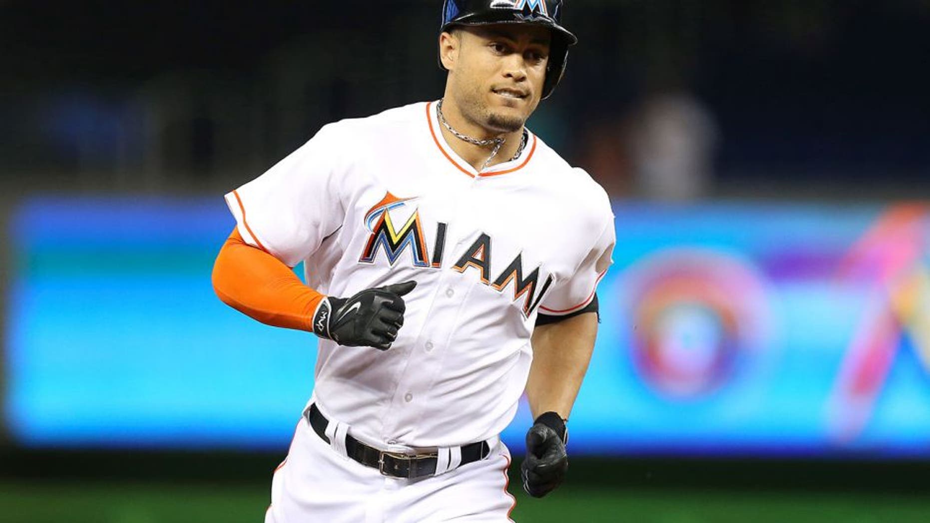 The Miami Marlins' Giancarlo Stanton rounds third after hitting a solo home run in the second inning against the St. Louis Cardinals on Wednesday, June 24, 2015, at Marlins Park in Miami. The Cards won, 6-1. (David Santiago/El Nuevo Herald/TNS via Getty Images)