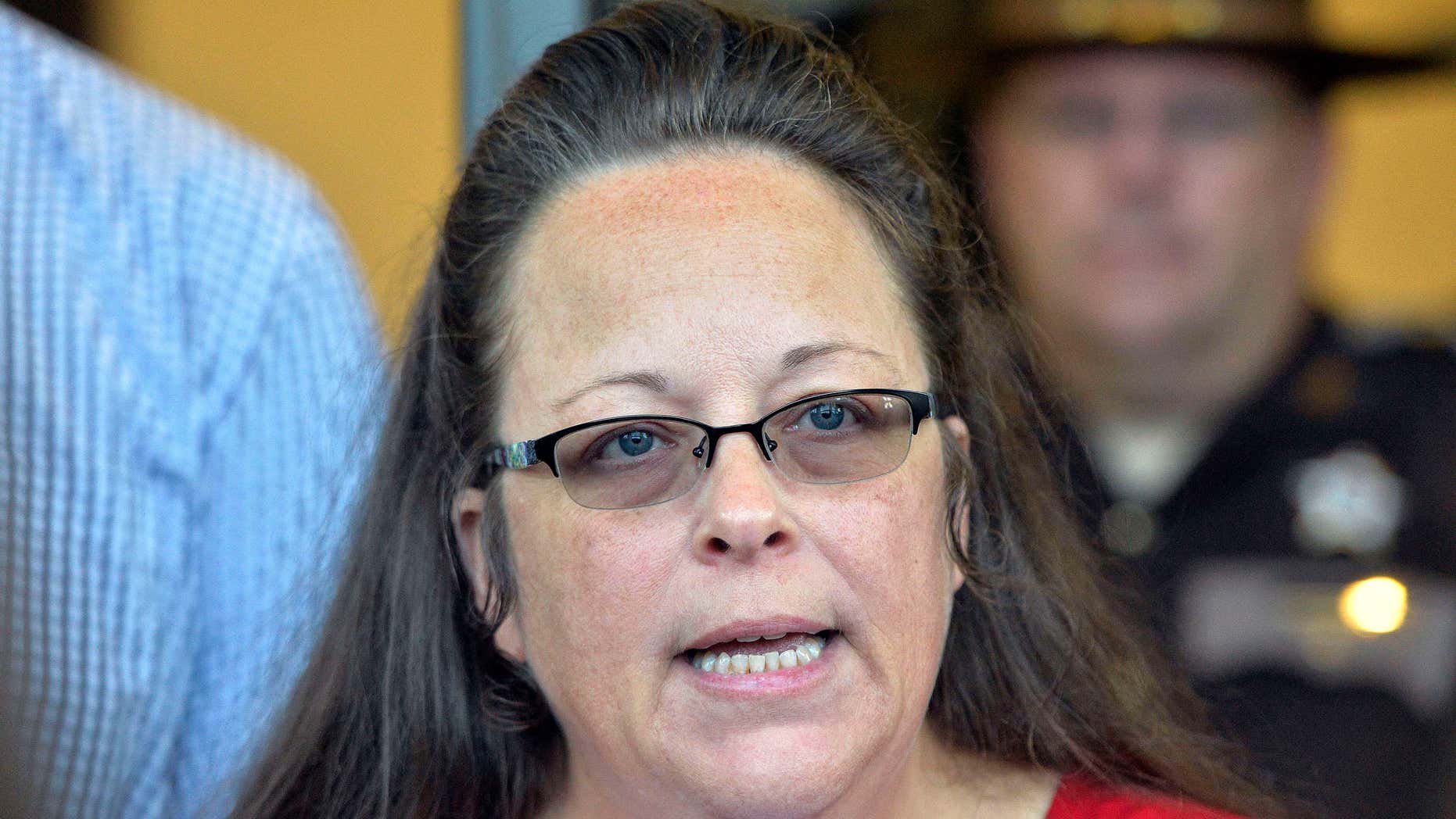 Kim Davis should pay legal fees for gay couples who sued, Kentucky governor