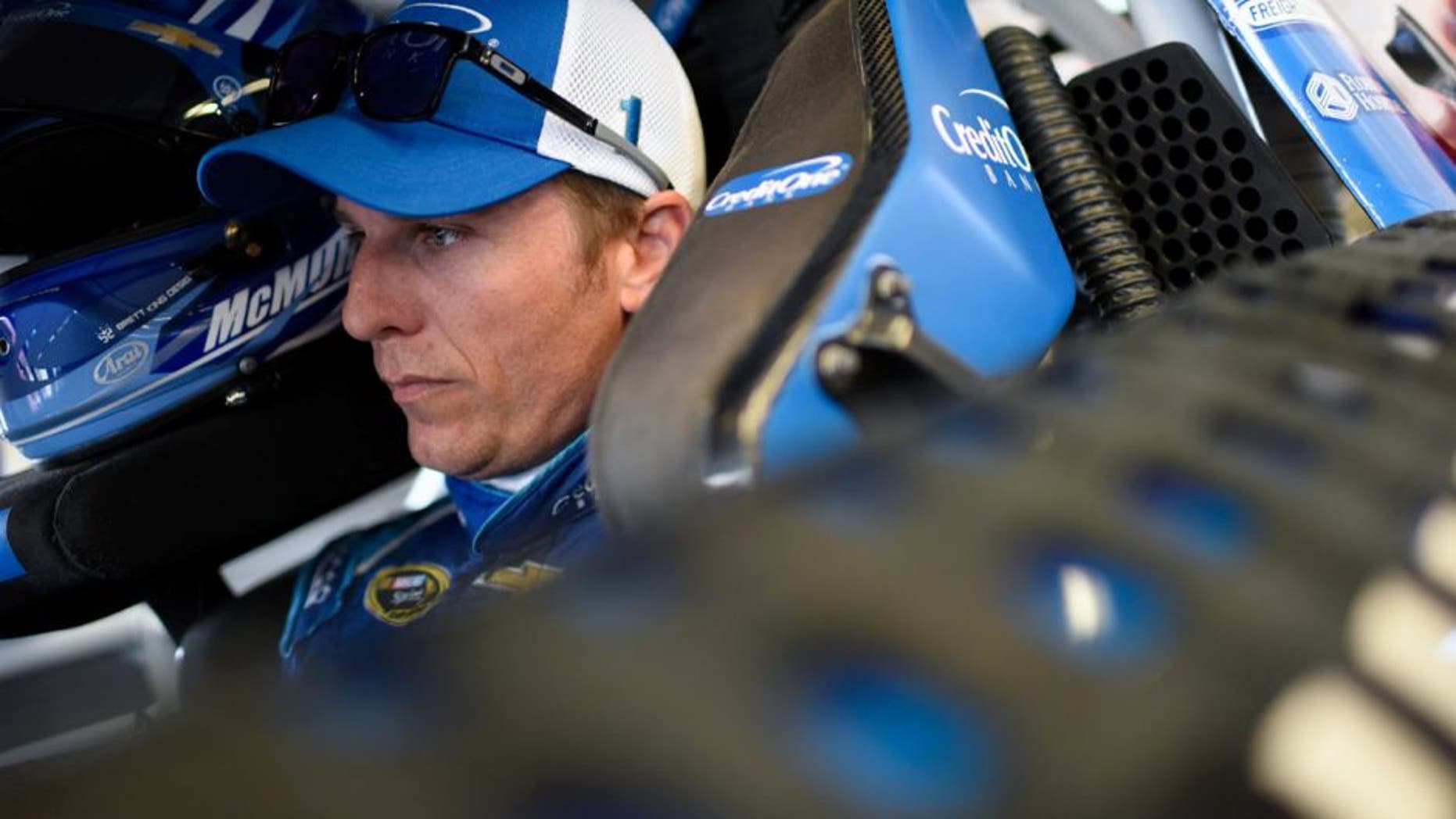 DAYTONA BEACH, FL - JUNE 30: Jamie McMurray, driver of the #1 Credit One Chevrolet, sits in his car during practice for the NASCAR Sprint Cup Series Coke Zero 400 at Daytona International Speedway on June 30, 2016 in Daytona Beach, Florida. (Photo by Jared C. Tilton/Getty Images)