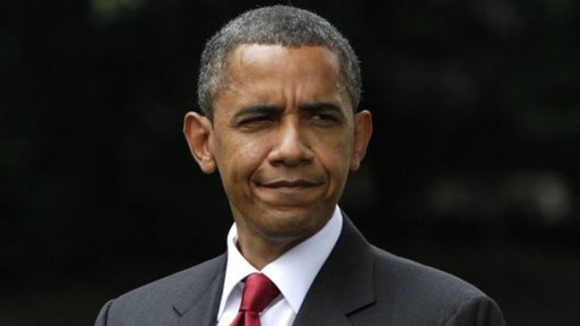 President Barack Obama pauses after walking Israeli Prime Minister Benjamin Netanyahu to his car outside the White House in Washington, Tuesday, July 6, 2010. (AP Photo/Carolyn Kaster)