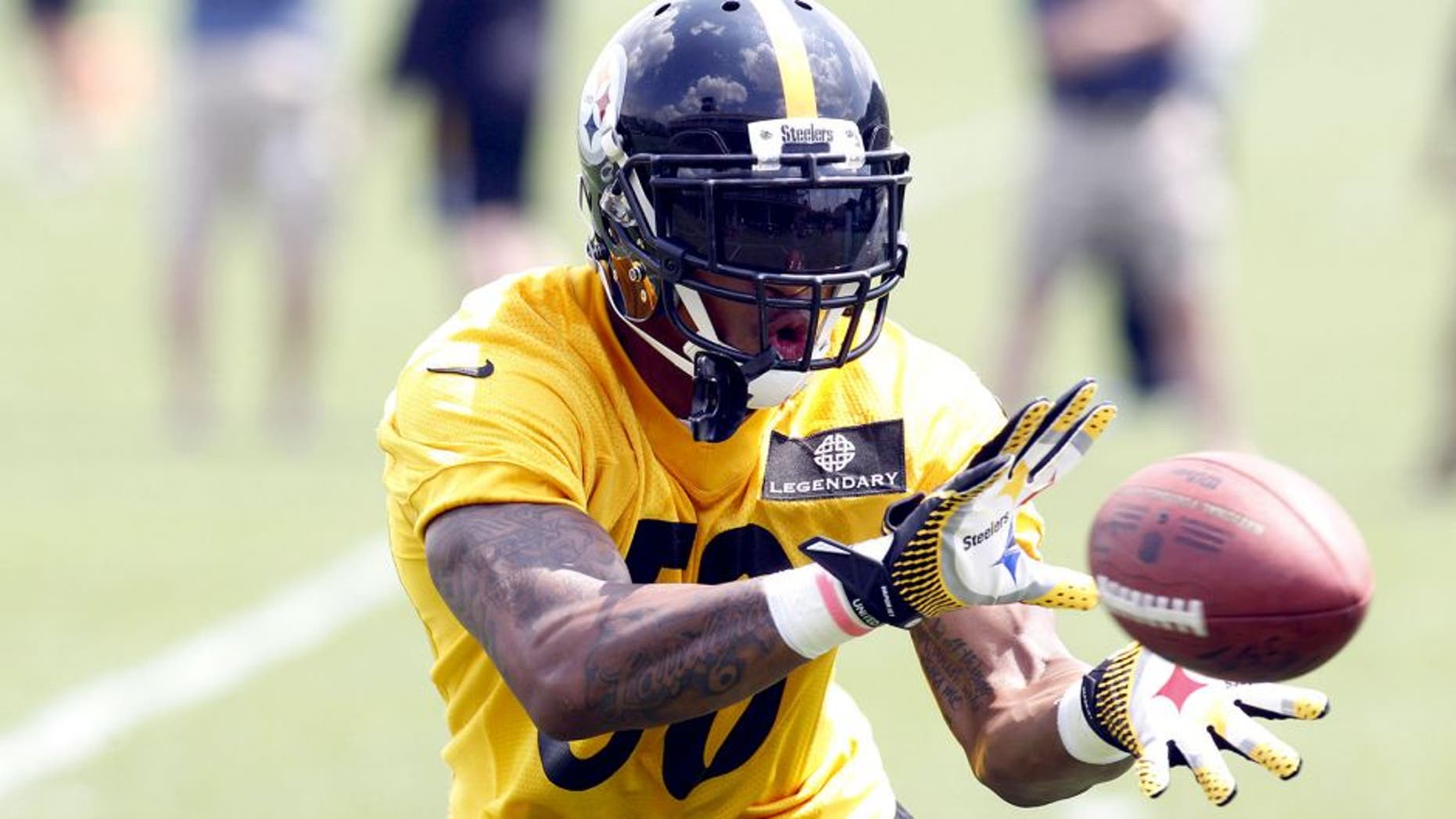 Jun 17, 2014; Pittsburgh, PA, USA; Pittsburgh Steelers linebacker Ryan Shazier (50) participates in drills during minicamp at the UPMC Sports Performance Complex. Mandatory Credit: Charles LeClaire-USA TODAY Sports