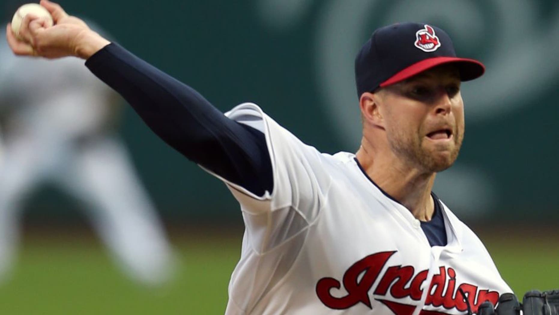Cleveland Indians starting pitcher Corey Kluber pitches to Houston Astros' Preston Tucker during the first inning of a baseball game, Tuesday, July 7, 2015, in Cleveland.
