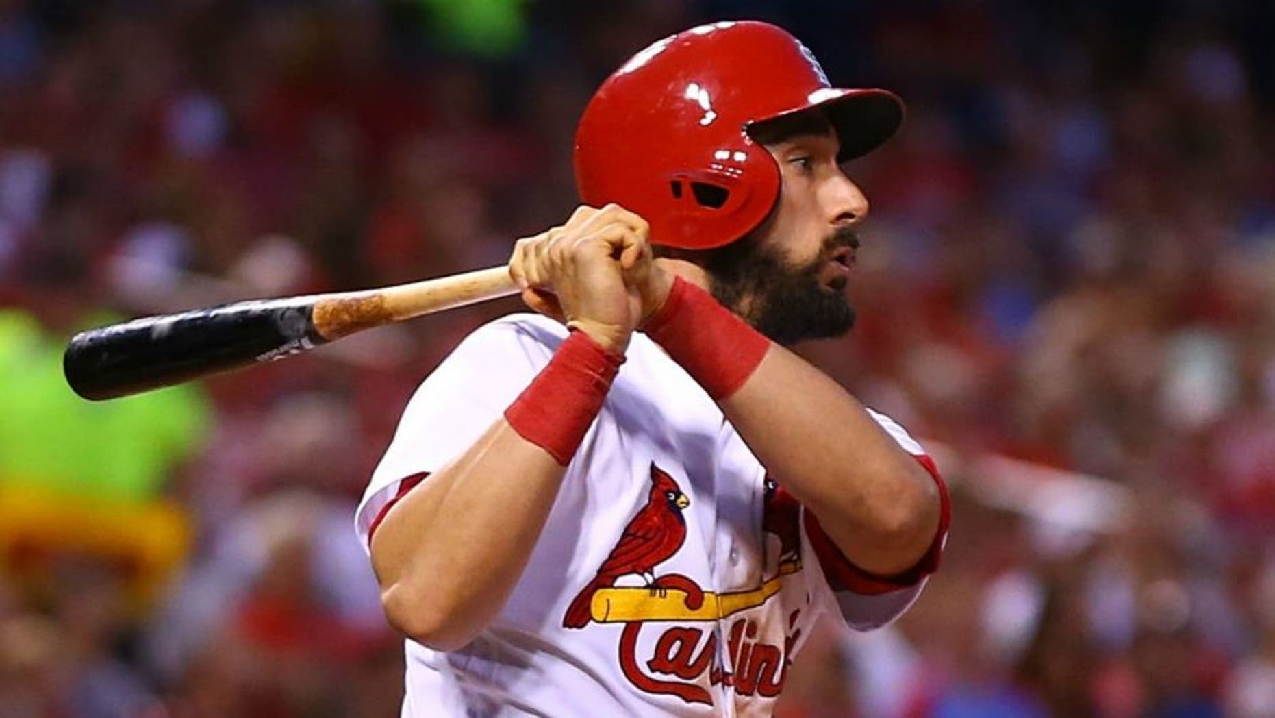 ST. LOUIS, MO - JULY 1: Matt Carpenter #13 of the St. Louis Cardinals hits an RBI single against the Milwaukee Brewers in the fourth inning at Busch Stadium on July 1, 2016 in St. Louis, Missouri. (Photo by Dilip Vishwanat/Getty Images)