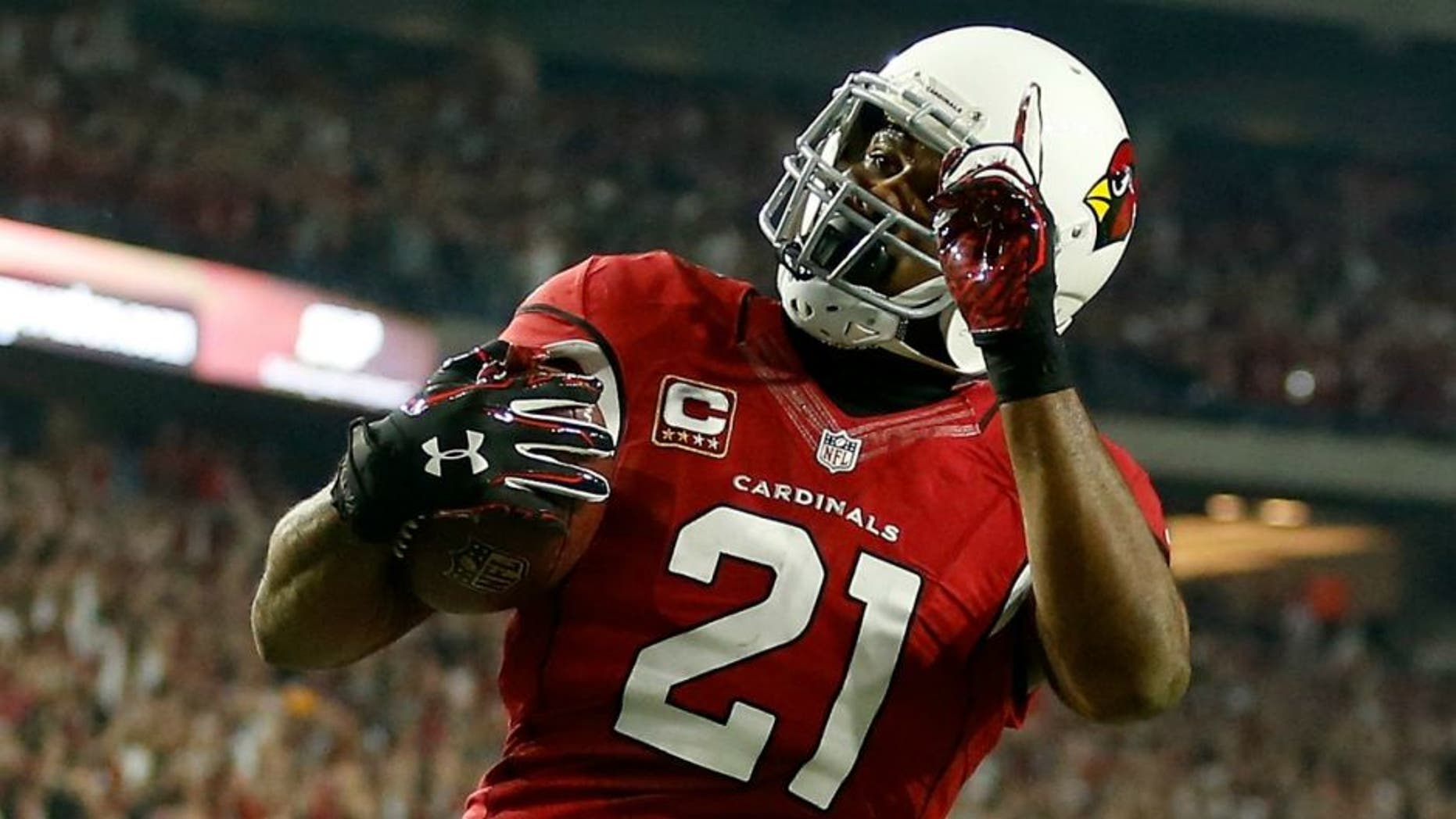 in the NFC Divisional Playoff Game at University of Phoenix Stadium on January 16, 2016 in Glendale, Arizona.,GLENDALE, AZ - JANUARY 16: Cornerback Patrick Peterson #21 of the Arizona Cardinals celebrates as he runs an interception for a touchdown back during the first half of the NFC Divisional Playoff Game against the Green Bay Packers at University of Phoenix Stadium on January 16, 2016 in Glendale, Arizona. The play was called back on a penalty. (Photo by Christian Petersen/Getty Images)