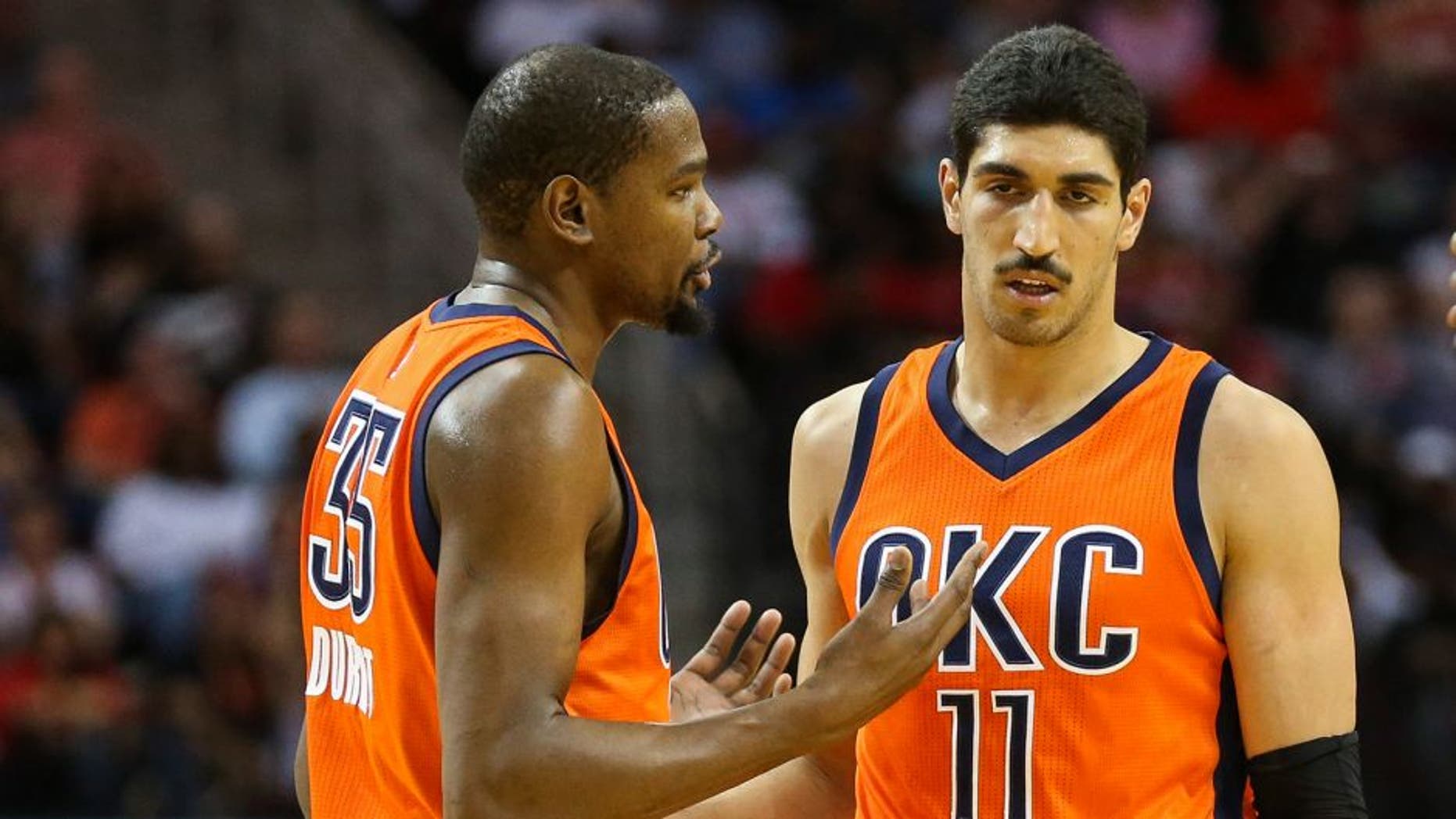 Apr 3, 2016; Houston, TX, USA; Oklahoma City Thunder forward Kevin Durant (35) talks with center Enes Kanter (11) and guard Randy Foye (6) during the second half against the Houston Rockets at Toyota Center. The Rockets won 118-110. Mandatory Credit: Troy Taormina-USA TODAY Sports