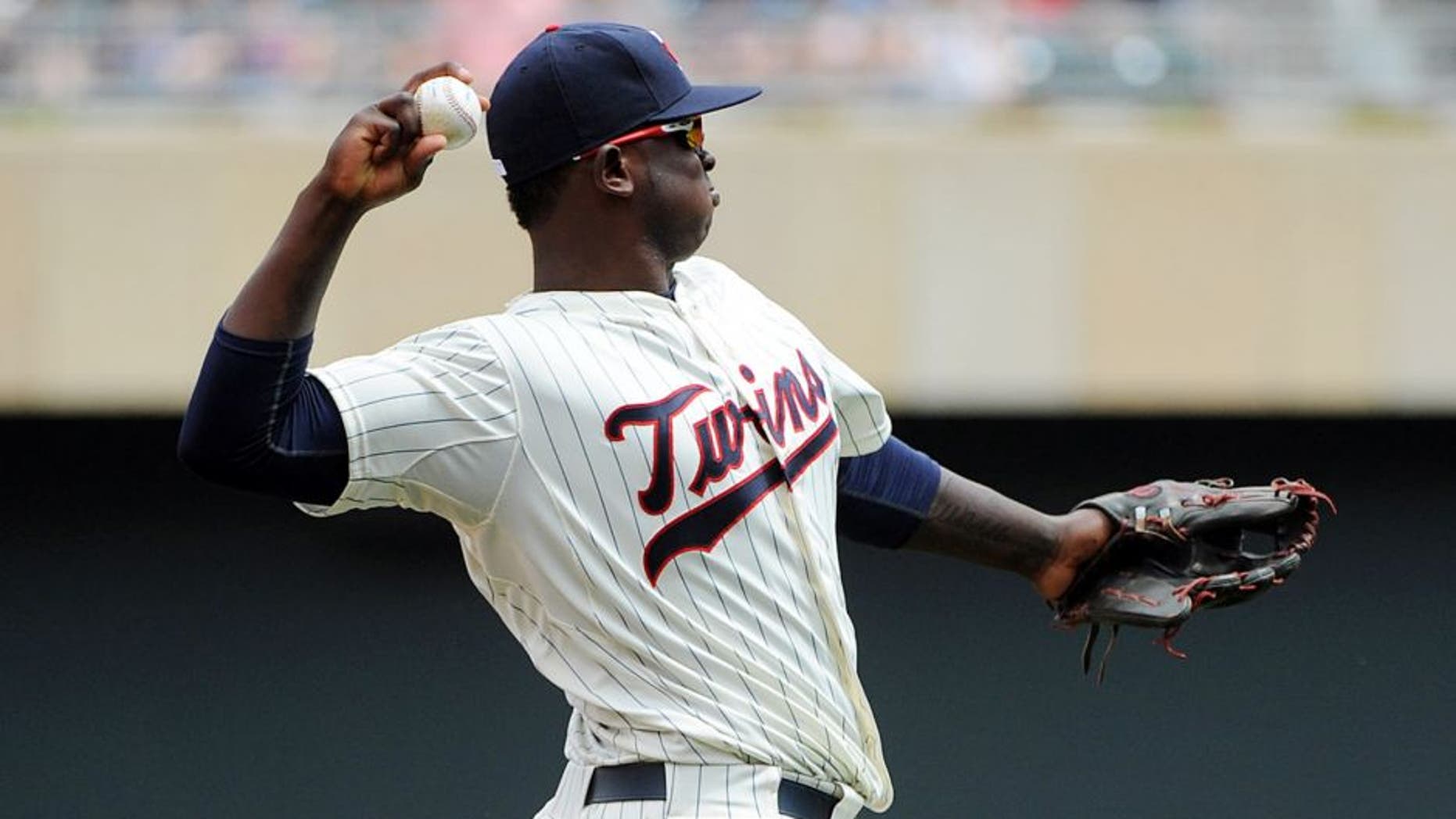 Jul 8, 2015; Minneapolis, MN, USA; Minnesota Twins third baseman Miguel Sano (22) warms up prior to the ninth inning against the Baltimore Orioles at Target Field. The Twins win 5-3 over the Orioles. Mandatory Credit: Marilyn Indahl-USA TODAY Sports