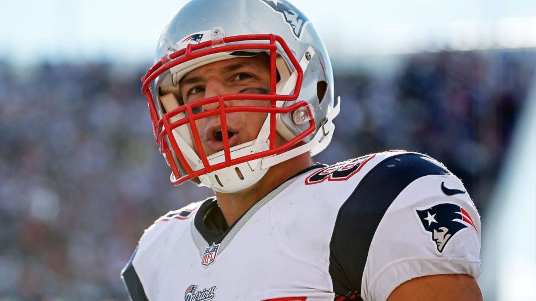 ORCHARD PARK, NY - OCTOBER 12: Rob Gronkowski #87 of the New England Patriots celebrates after a reception against the Buffalo Bills during the second half at Ralph Wilson Stadium on October 12, 2014 in Orchard Park, New York. (Photo by Tom Szczerbowski/Getty Images)