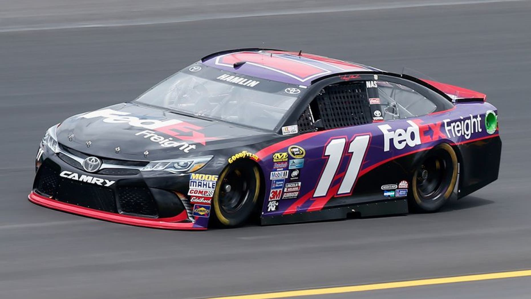 SPARTA, KY - JULY 07: Denny Hamlin, driver of the #11 FedEx Freight Toyota, practices for the NASCAR Sprint Cup Series Quaker State 400 at Kentucky Speedway on July 7, 2016 in Sparta, Kentucky. (Photo by Brian Lawdermilk/NASCAR via Getty Images)