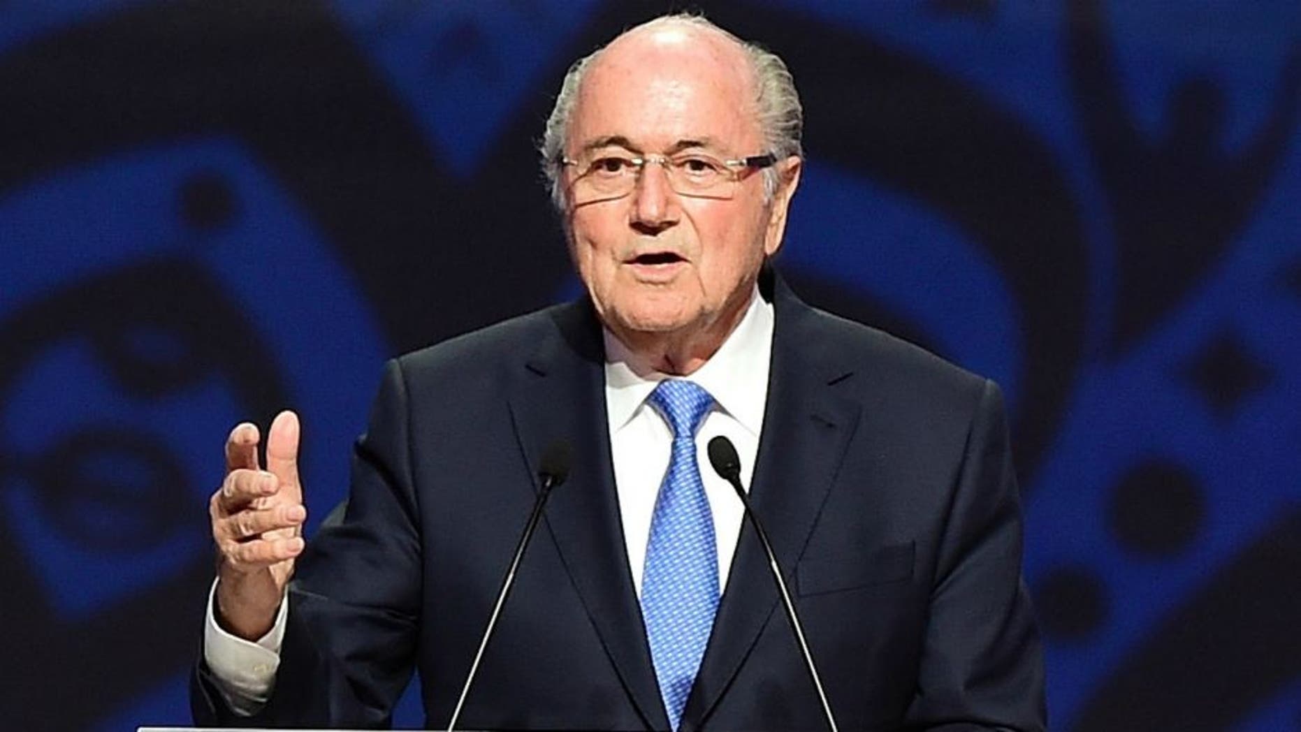 SAINT PETERSBURG, RUSSIA - JULY 25: FIFA President Joseph S. Blatter speaks as Vladimir Putin, President of Russia looks on during the Preliminary Draw of the 2018 FIFA World Cup in Russia at The Konstantin Palace on July 25, 2015 in Saint Petersburg, Russia. (Photo by Shaun Botterill/Getty Images)