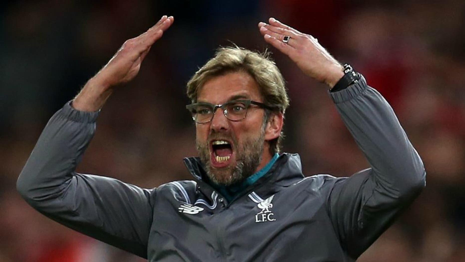 BASEL, SWITZERLAND - MAY 18: Liverpool manager Jurgen Klopp encourages the fans during the UEFA Europa League Final match between Liverpool and Sevilla at St. Jakob-Park on May 18, 2016 in Basel, Switzerland. (Photo by Chris Brunskill Ltd/Getty Images)
