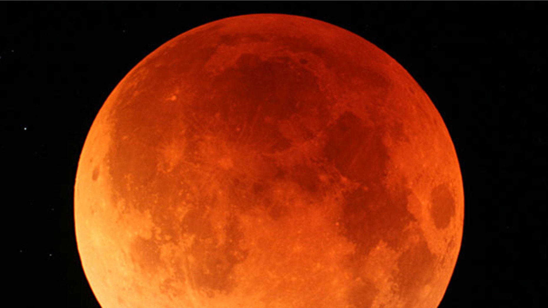 A view of the lunar eclipse from Japan's northernmost main island of Hokkaido on Aug. 28, 2007. The Earth's shadow crept across the moon's surface slowly eclipsing it and turning it to shades of orange and red during second total lunar eclipse this year.