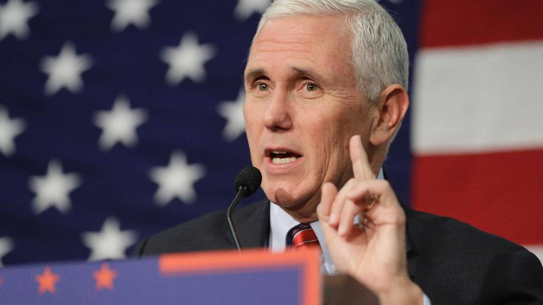 FILE -In this Sept. 30, 2016 file photo, Republican vice presidential candidate, Indiana Gov. Mike Pence speaks in Fort Wayne, Ind. Pence musters all of his Midwestern earnestness as he describes Donald Trump as “a man of faith.” He says the Republican nominee is “a man I’ve prayed with and gotten to know on a personal level.” The description, in an interview with The Associated Press, stands in sharp relief to Trump's public profile over much of his career: a twice-divorced former playboy who has boasted of his sexual exploits, flaunted his wealth, used crass insults and made sweeping generalizations about whole races. (AP Photo/Darron Cummings, File)
