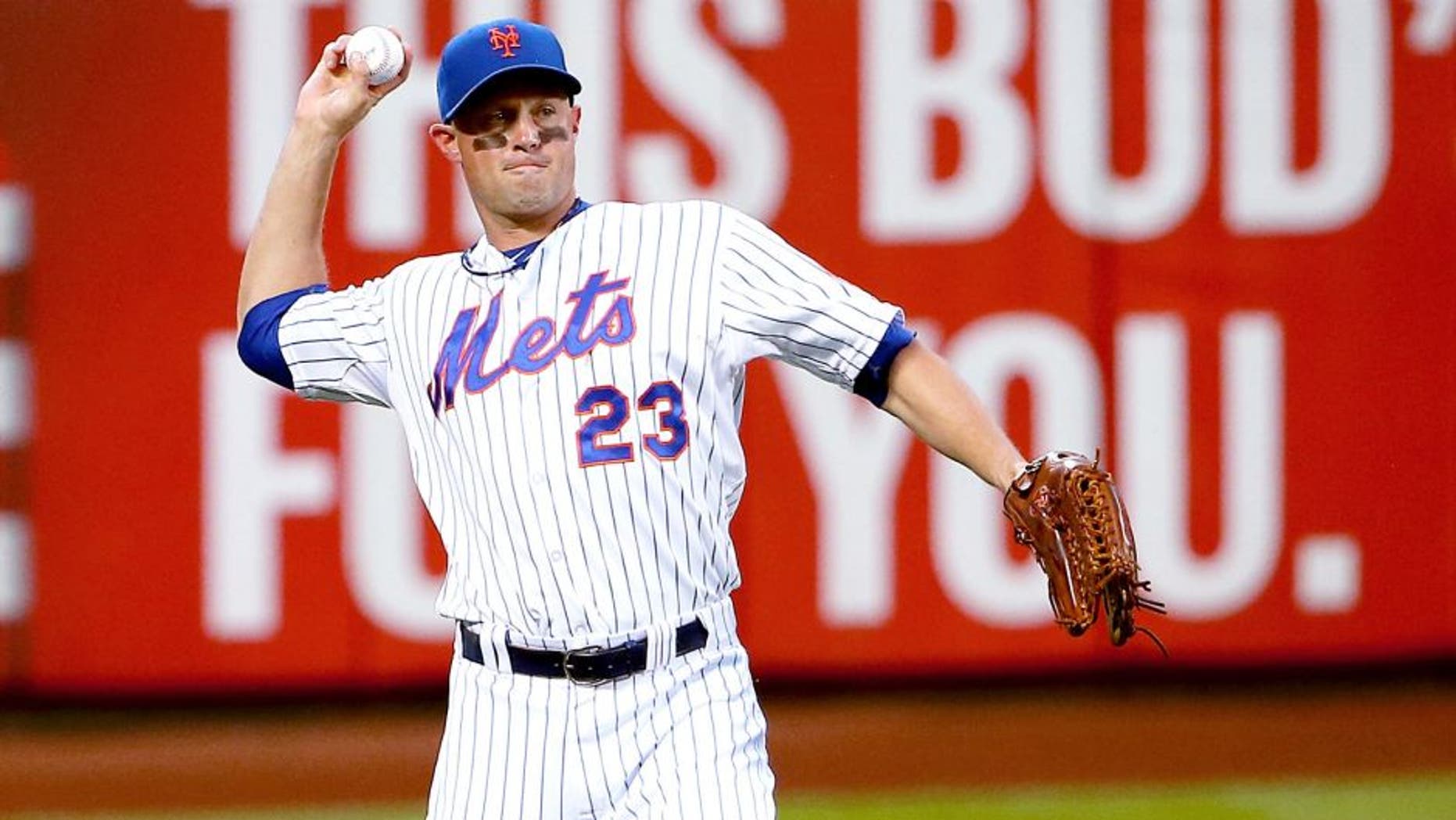NEW YORK, NY - JUNE 30: Michael Cuddyer #23 of the New York Mets fields the ball in the third inning against the Chicago Cubs on June 30, 2015 at Citi Field in the Flushing Neighborhood of the Queens borough of New York City. (Photo by Nate Shron/Getty Images)