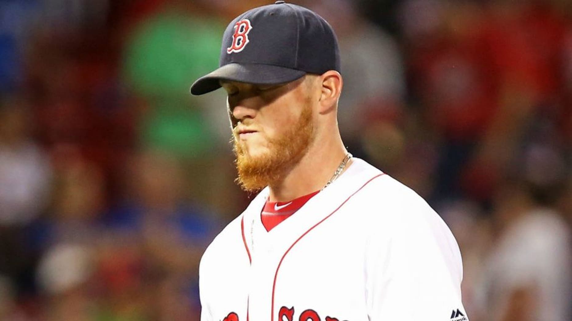 > at Fenway Park on July 5, 2016 in Boston, Massachusetts.,BOSTON, MA - JULY 05: Craig Kimbrel #46 of the Boston Red Sox walks off the field in the ninth inning after giving up a three-run home run to Robinson Chirinos #61 of the Texas Rangers at Fenway Park on July 5, 2016 in Boston, Massachusetts. (Photo by Adam Glanzman/Getty Images)