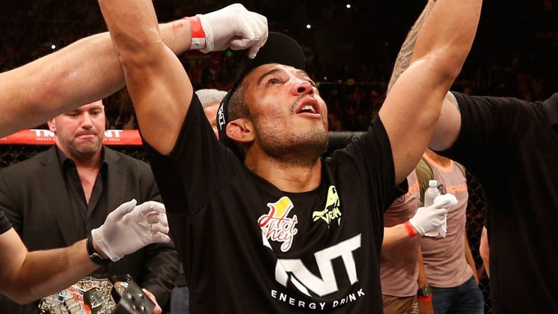 RIO DE JANEIRO, BRAZIL - OCTOBER 25: Jose Aldo of Brazil celebrates after his unanimous-decision victory over Chad Mendes in their featherweight championship bout during the UFC 179 event at Maracanazinho on October 25, 2014 in Rio de Janeiro, Brazil. (Photo by Josh Hedges/Zuffa LLC/Zuffa LLC via Getty Images)