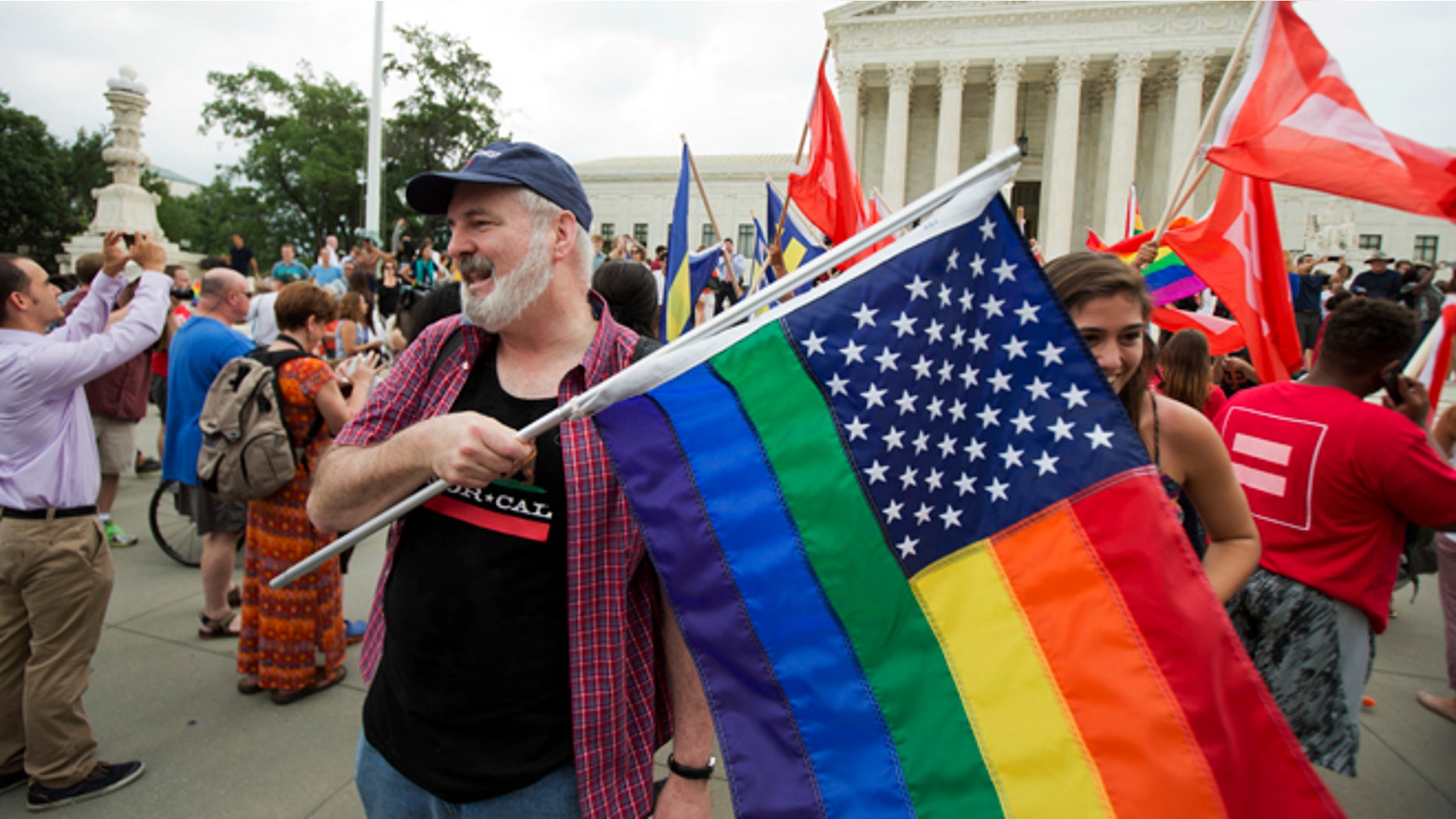 June 26, 2015: Supporters celebrate outside the U.S. Supreme Court in Washington after the court declared that same-sex couples have a right to marry anywhere in the United States.