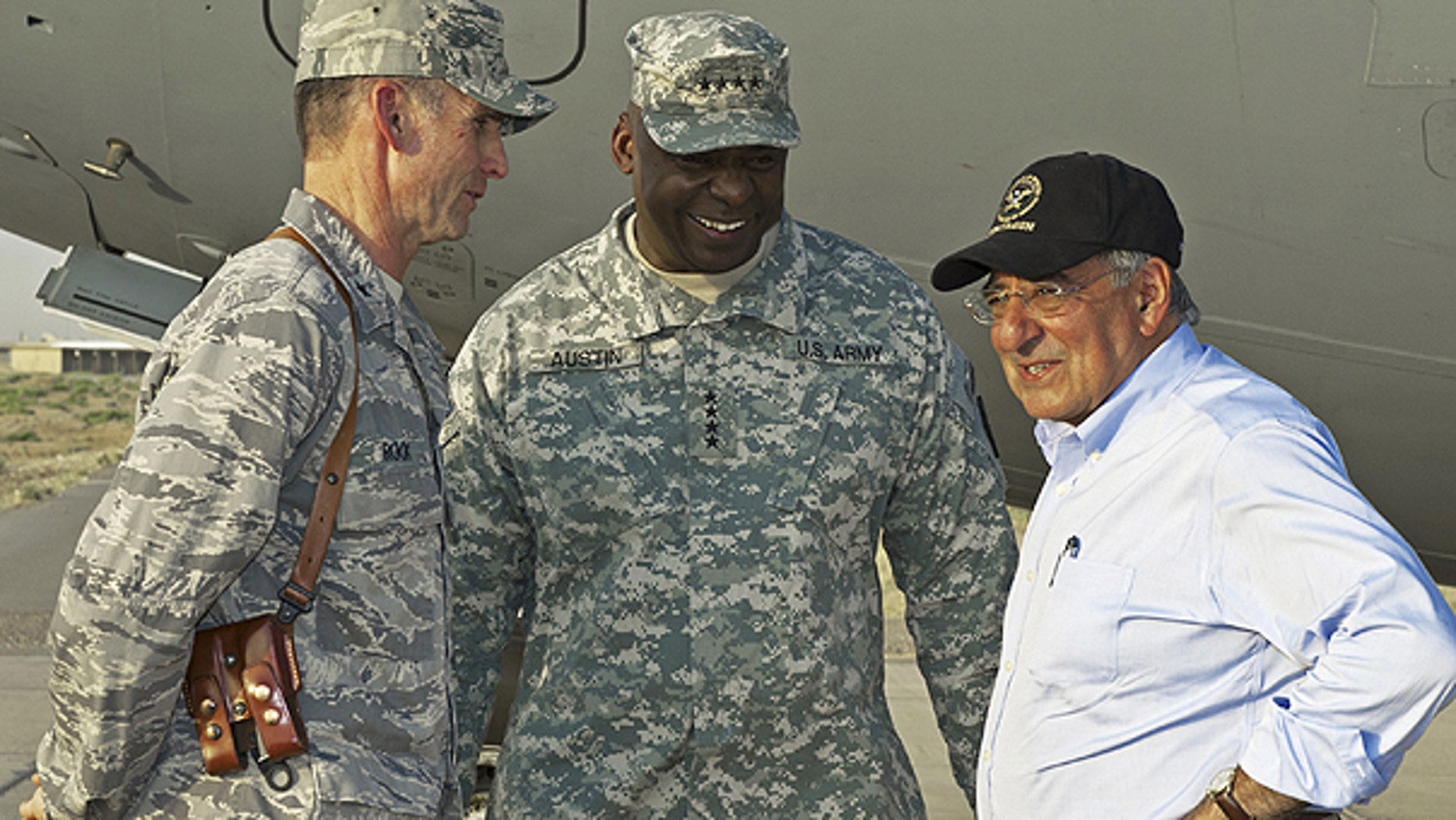July 10: U.S. Secretary of Defense Leon Panetta, right, has a brief chat with his U.S. Generals Anthony Rock, left, and Lloyd Austin during an unannounced visit by the U.S. Secretary to Camp Dwyer in southern Afghanistan.