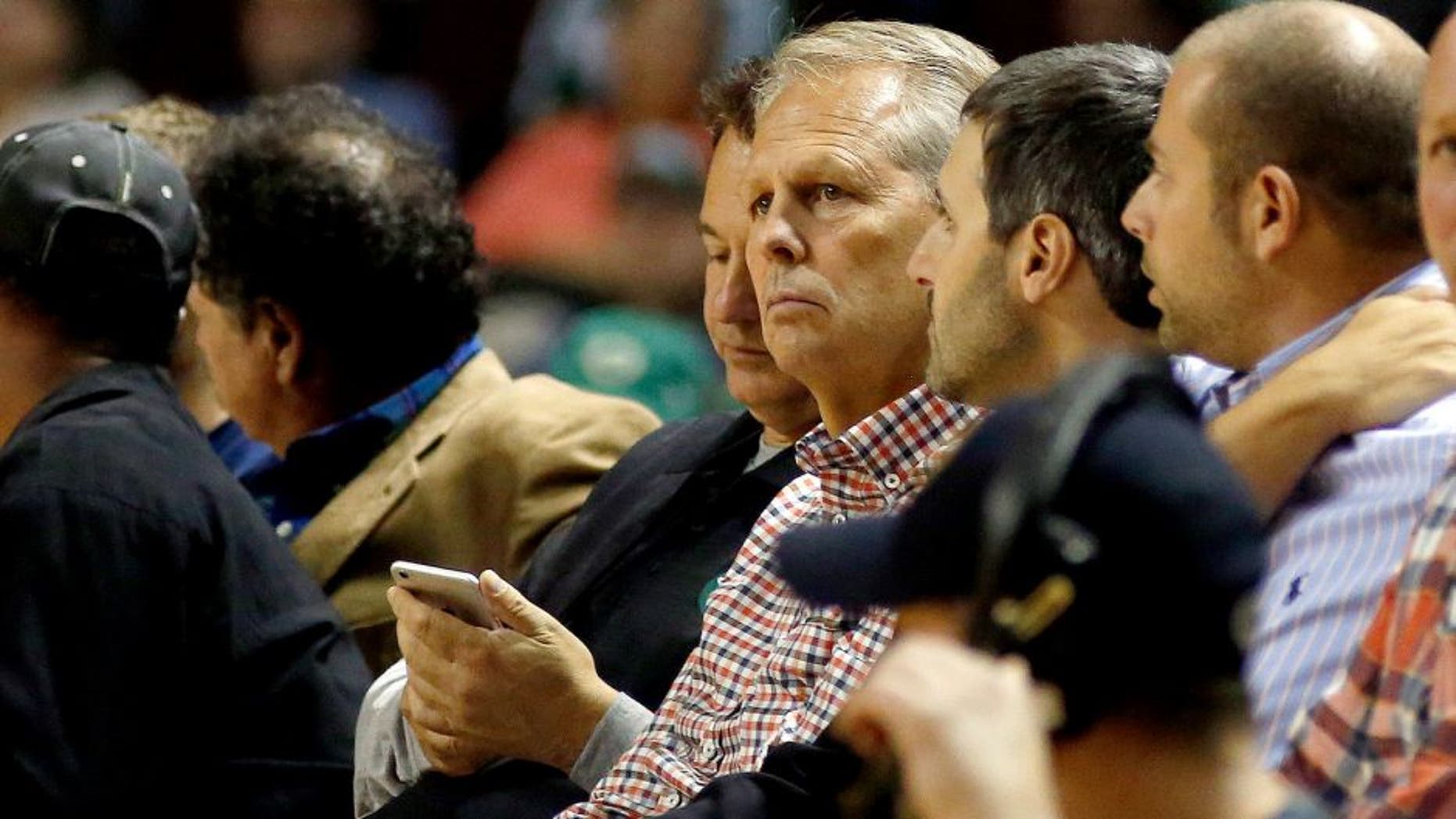 PORTLAND, ME - OCTOBER 15: Danny Ainge, general manager of the Boston Celtics, sits on the sidelines during a pre-season NBA basketball game at the Cross Insurance Arena, Wednesday, October 15, 2014. (Photo by Gabe Souza/Portland Press Herald via Getty Images)