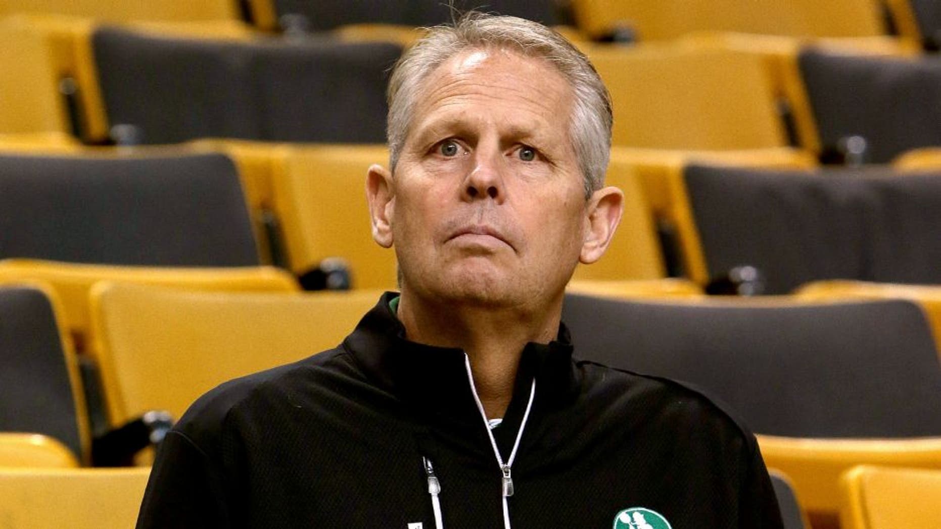 BOSTON - OCTOBER 22: Boston Celtics President of Basketball Operations Danny Ainge in Red Auerbach's old seat. The Boston Celtics take on the Brooklyn Nets in a preseason exhibition game at TD Garden. (Photo by Barry Chin/The Boston Globe via Getty Images)