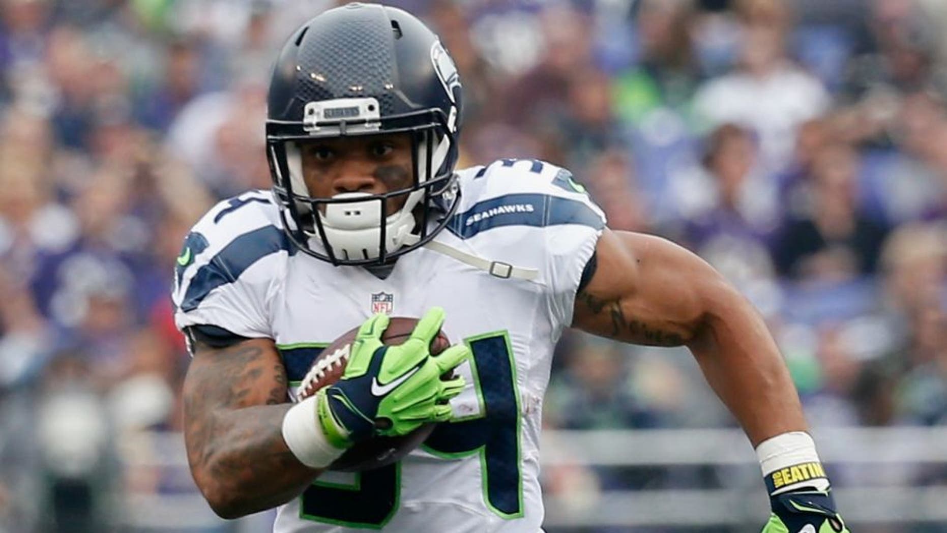 at M&T Bank Stadium on December 13, 2015 in Baltimore, Maryland.,BALTIMORE, MD - DECEMBER 13: Running back Thomas Rawls #34 of the Seattle Seahawks carries the ball in the first half against the Baltimore Ravens at M&T Bank Stadium on December 13, 2015 in Baltimore, Maryland. (Photo by Rob Carr/Getty Images)