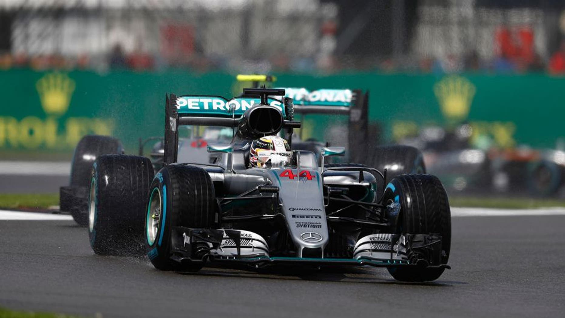 Silverstone, Northamptonshire, UK Sunday 10 July 2016. Lewis Hamilton, Mercedes F1 W07 Hybrid, leads Nico Rosberg, Mercedes F1 W07 Hybrid. World Copyright: Glenn Dunbar/LAT Photographic ref: Digital Image _V2I0159