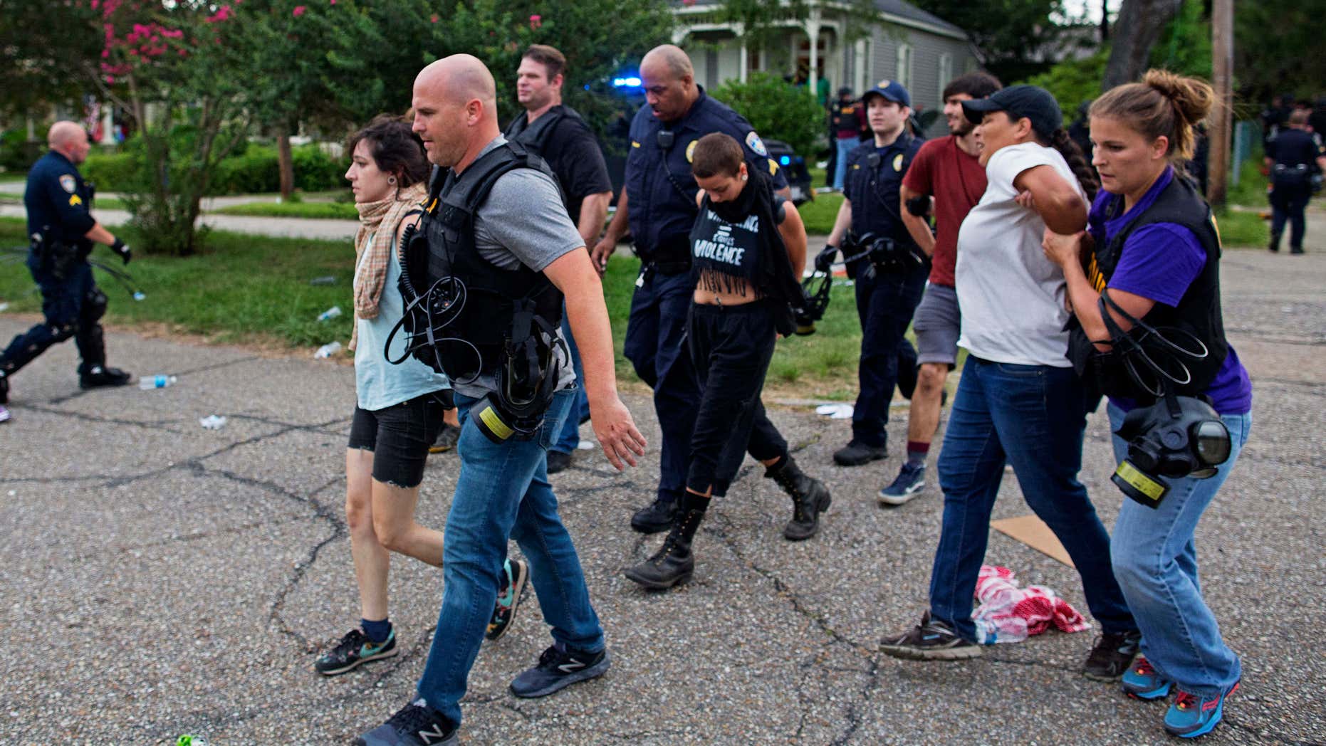July 10, 2016: Police arrest protesters in a residential neighborhood in Baton Rouge, La.