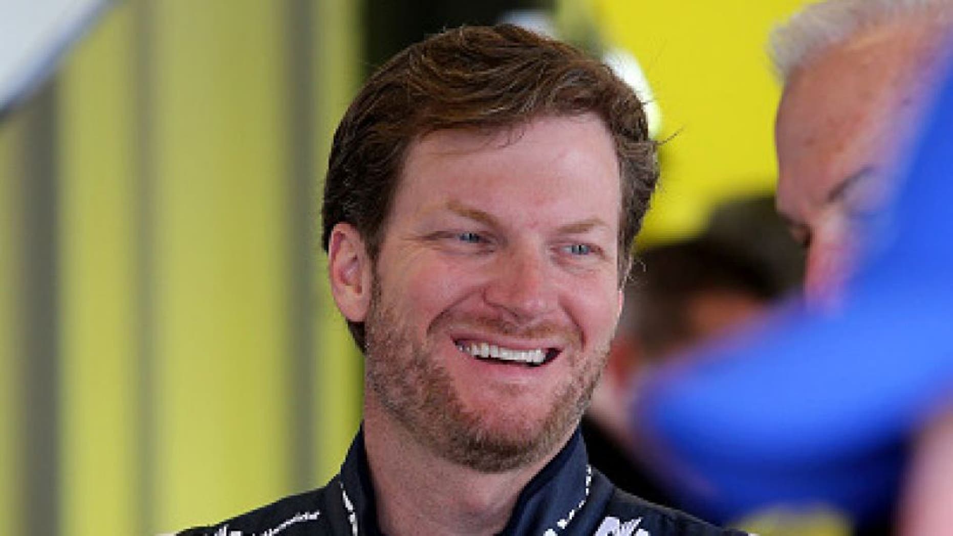 SPARTA, KY - JULY 07: Dale Earnhardt Jr., driver of the #88 Nationwide Chevrolet, stands in the garage area during practice for the NASCAR Sprint Cup Series Quaker State 400 at Kentucky Speedway on July 7, 2016 in Sparta, Kentucky. (Photo by Jerry Markland/Getty Images)