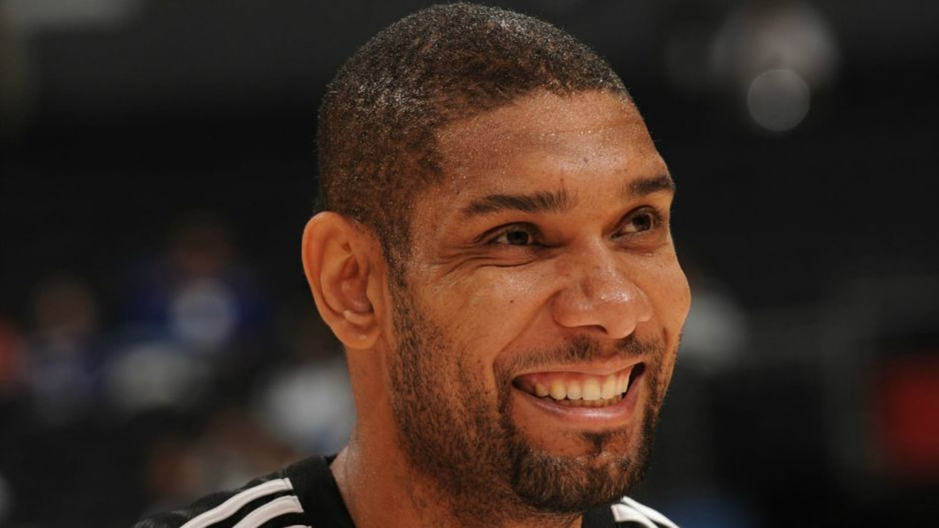 LOS ANGELES - NOVEMBER 17: Tim Duncan #21 of the San Antonio Spurs smiles during warmups prior to a game against the Los Angeles Clippers at Staples Center on November 17, 2008 in Los Angeles, California. NOTE TO USER: User expressly acknowledges and agrees that, by downloading and/or using this Photograph, user is consenting to the terms and conditions of the Getty Images License Agreement. Mandatory Copyright Notice: Copyright 2008 NBAE (Photo by Noah Graham/NBAE via Getty Images)