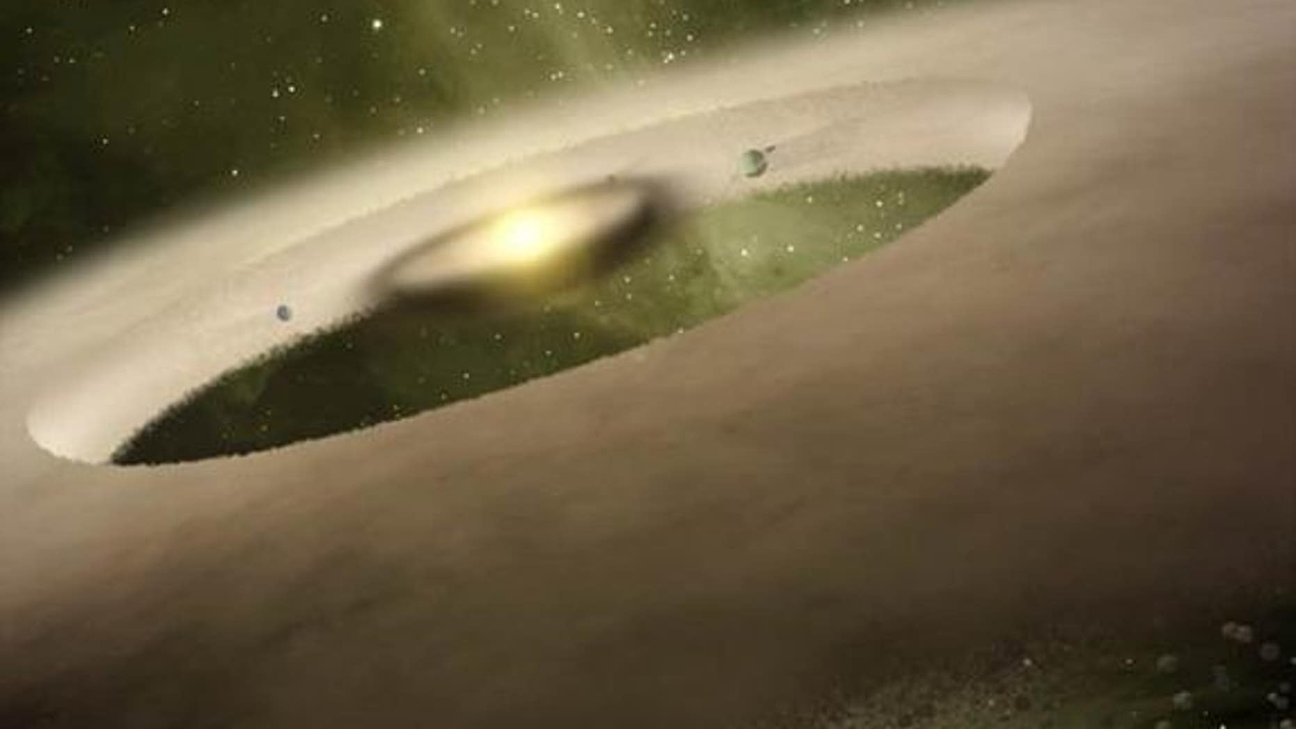 An artist's rendition of the 1-million-year-old star system UX Tau A, located approximately 450 light-years away. Observations from NASA's Sptizer Space Telescope showed a gap in the dusty disk swirling around the system's central star. Astrono
