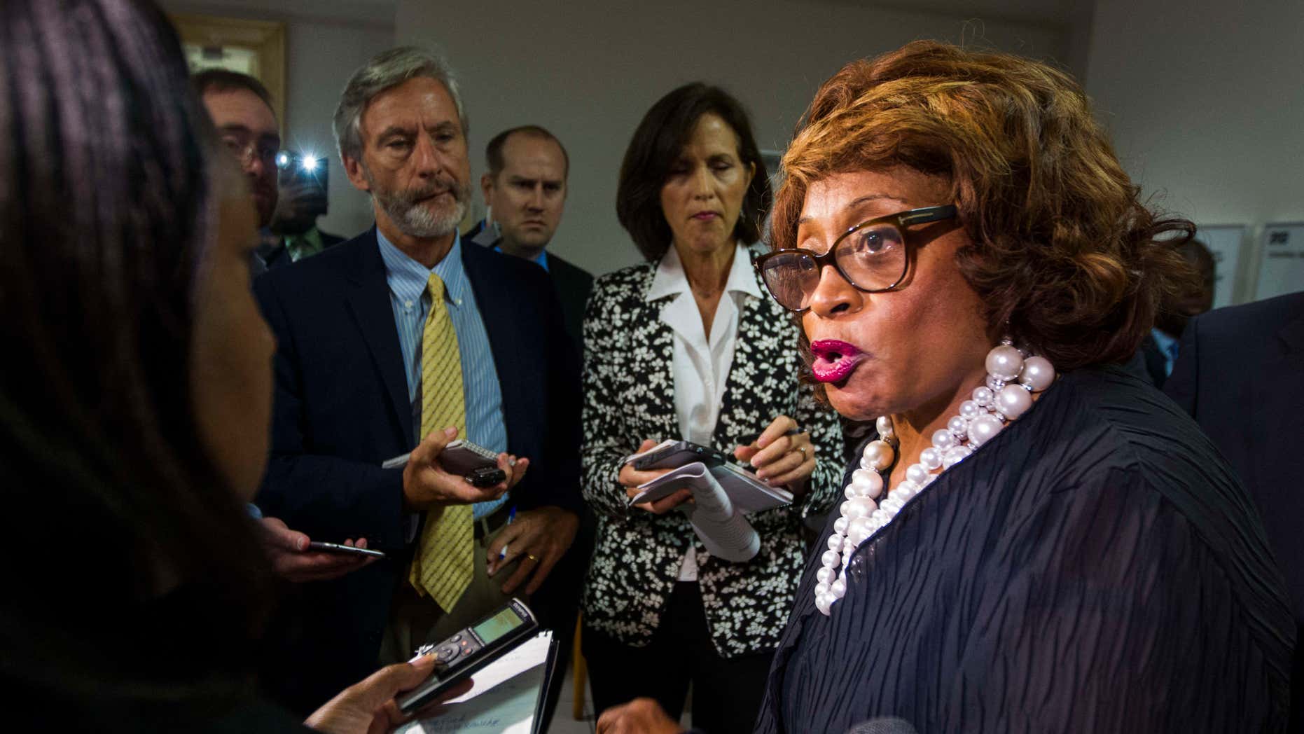 FILE - In this Aug. 13, 2015 file photo, Rep. Corrine Brown, D-Fla. talks with the press in Tallahassee, Fla.