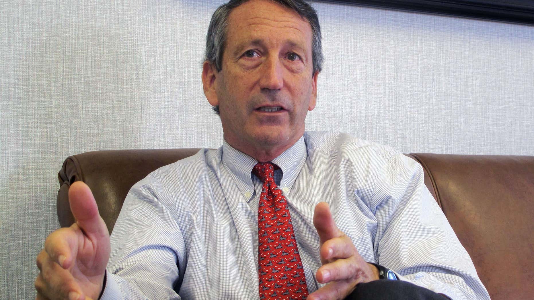 FILE - In this Dec. 18, 2013, file photo, U.S. Rep. Mark Sanford, R-S.C., discusses his first months back in Congress during an interview in Mount Pleasant, S.C.