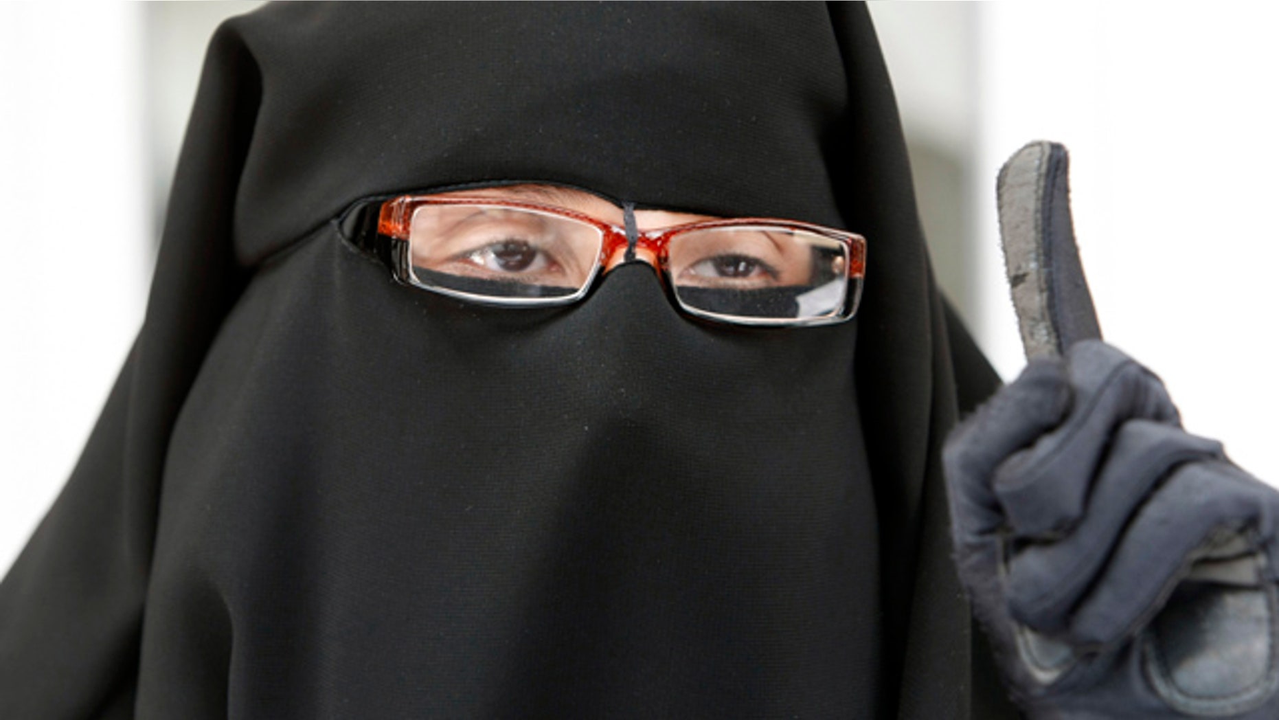 FILE - This May 18 2010 file photo shows France's Najat addressing reporters during a press conference in Montreuil, east of Paris. After a debate in which many lawmakers described their visceral reaction to face-covering veils, France's lower house of parliament looks set to approve a ban Tuesday July 13, 2010.(AP Photo/Remy de la Mauviniere, File)