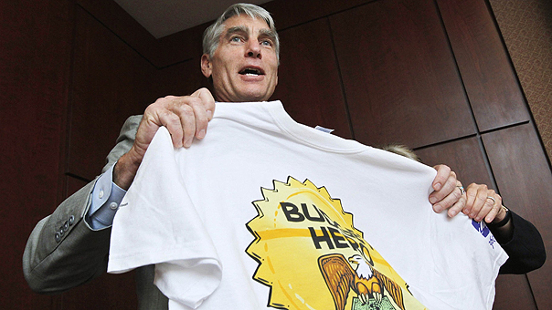 July 13: Sen. Mark Udall, D-Colo., shows his Budget Hero shirt at the Wilson Center's re-launching of the "Budget Game" on Capitol Hill in Washington.